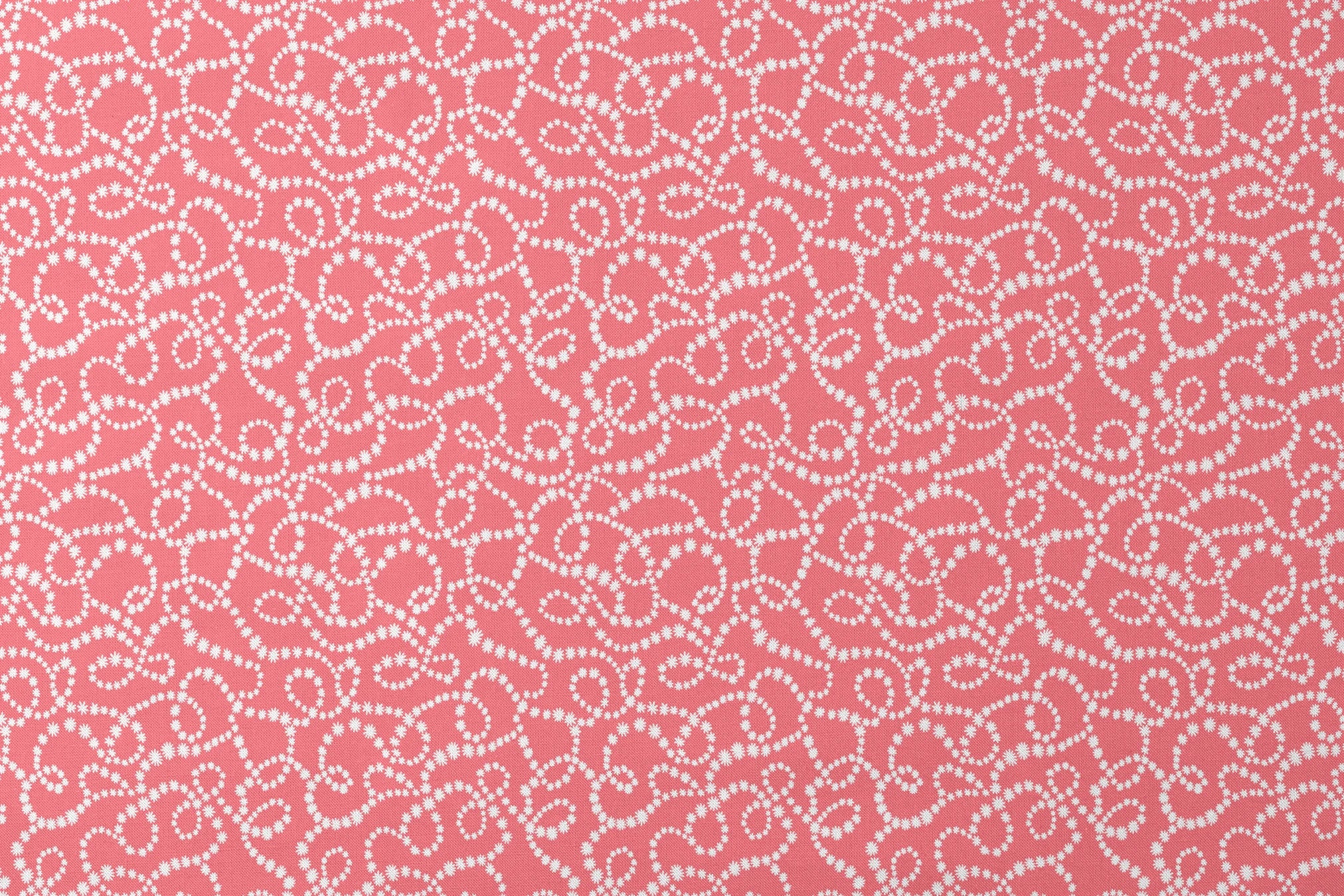 White dot patterns forming swirling chains on coral pink background designs flat mockup