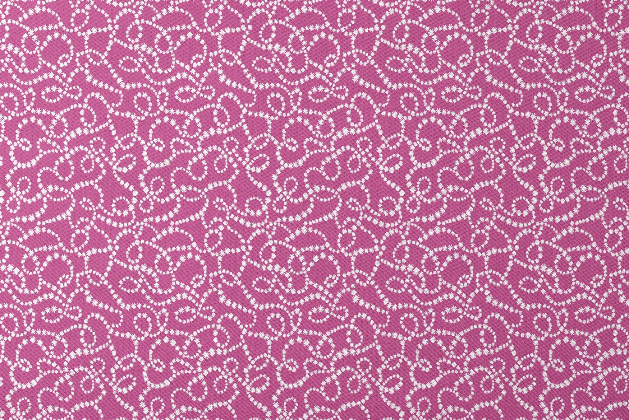 Magenta background with swirling white dotted pattern resembling pearl strands in decorative loops designs flat mockup