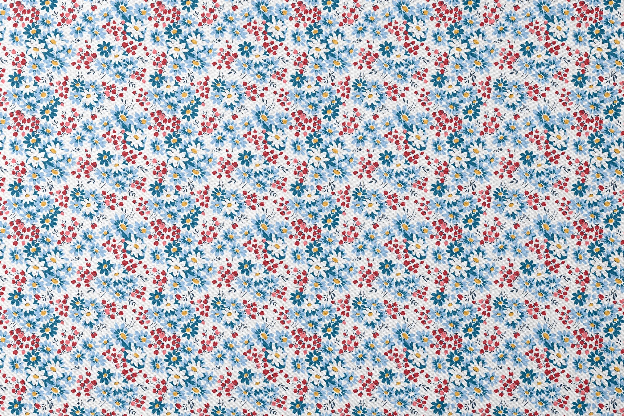 Blue and white daisies with small red berries scattered across a light background in a floral pattern designs flat mockup