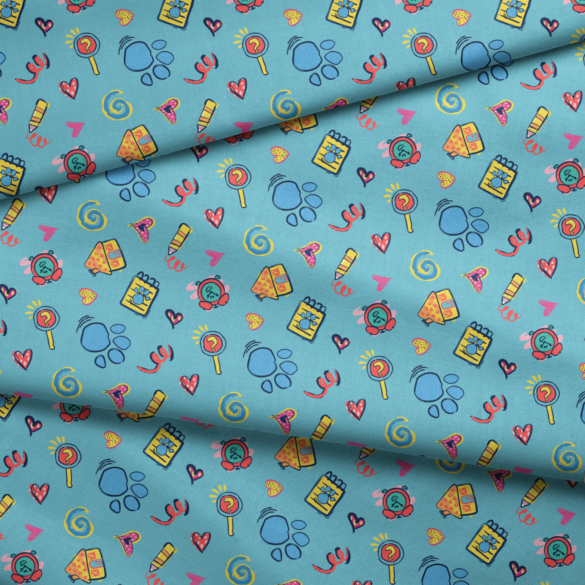 Blue’s Clues doodle-style pattern featuring paw prints, a crayon, spiral notebook, hearts, and magnifying glass on a light blue background. fabric fold mockup