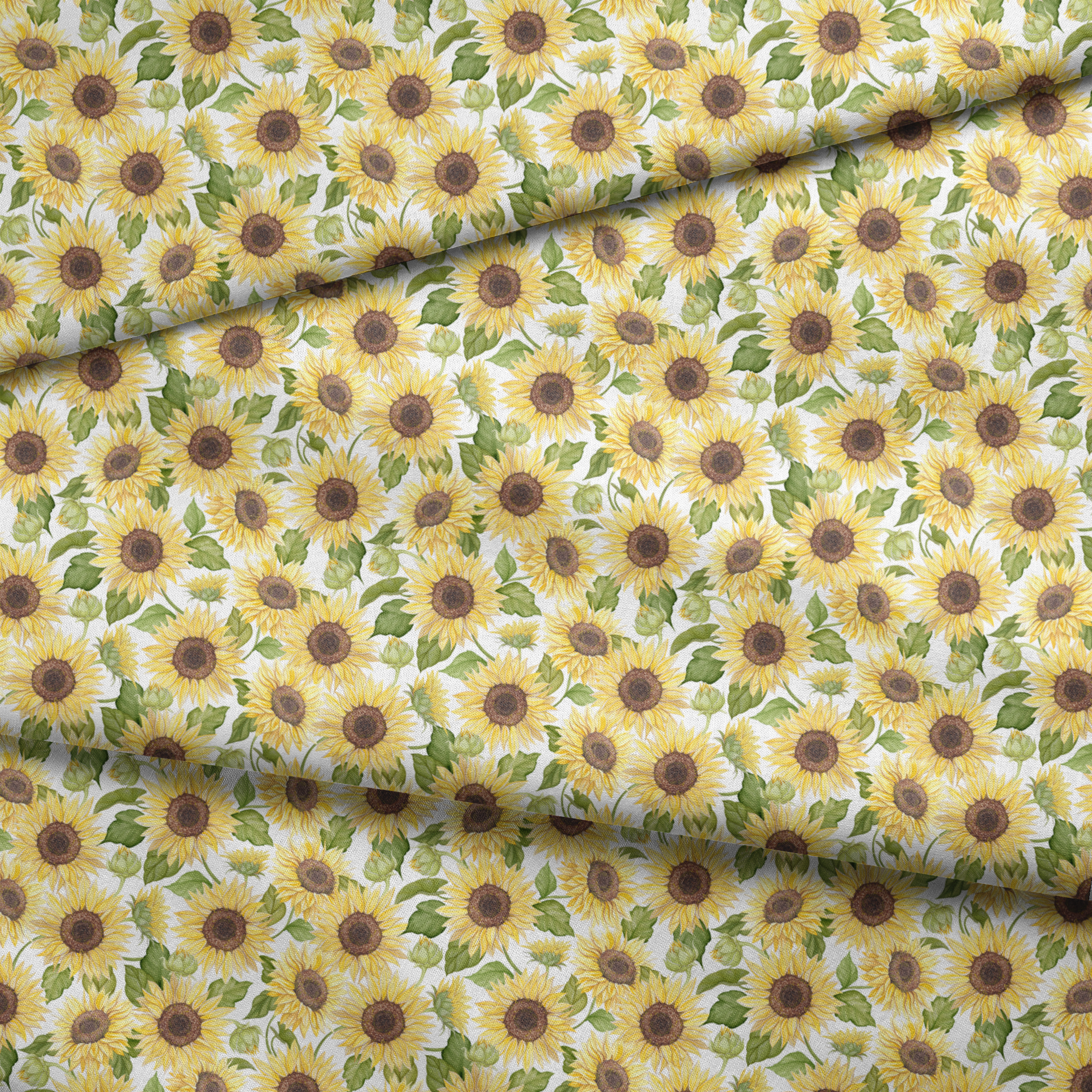 Watercolor-style packed sunflower pattern with yellow blooms and green leaves on a white background, designed by Nicole Tamarin. fabric fold mockup