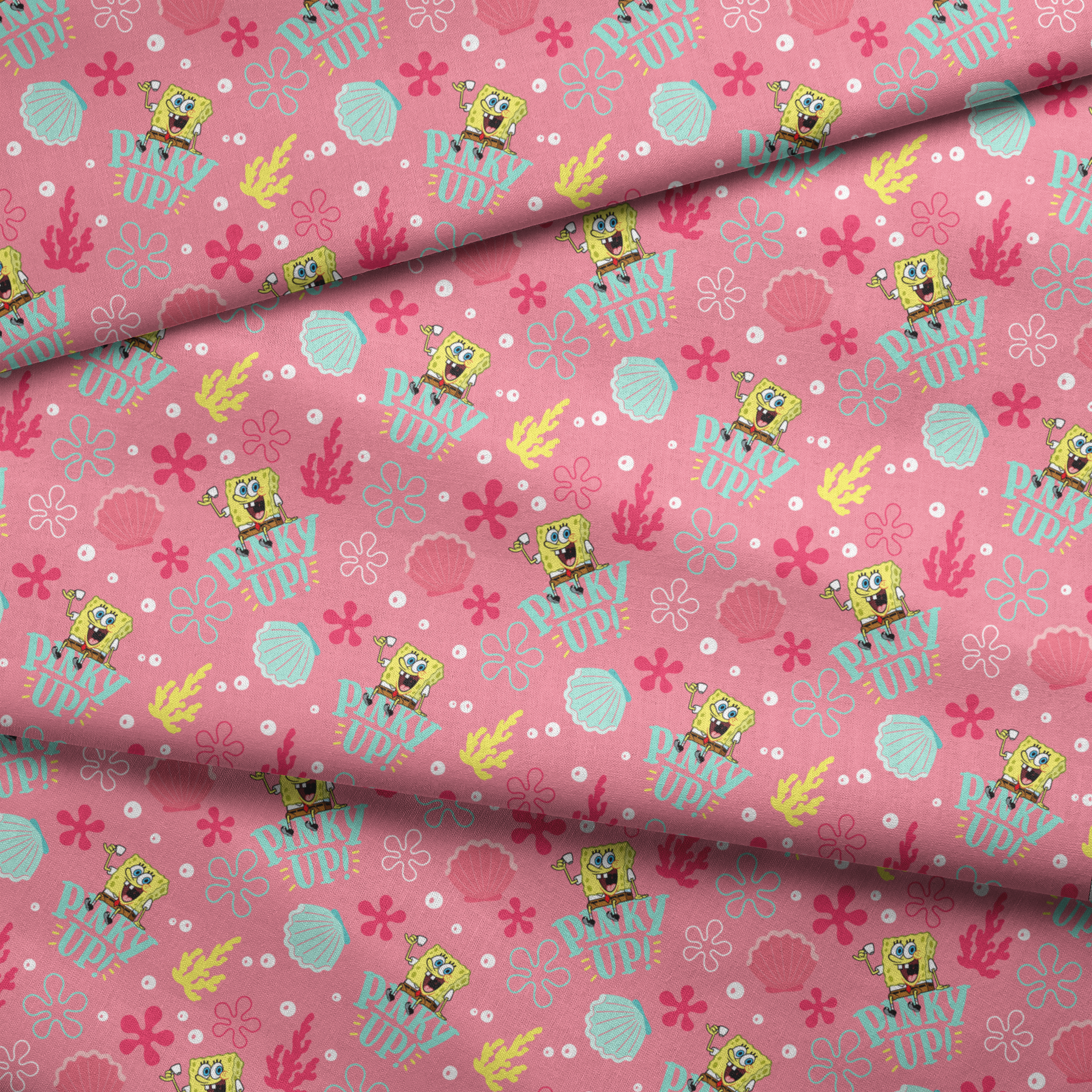 SpongeBob holding a teacup with “Pinky Up!” text, surrounded by sea shells, coral, and flower shapes on a pink background. fabric fold mockup