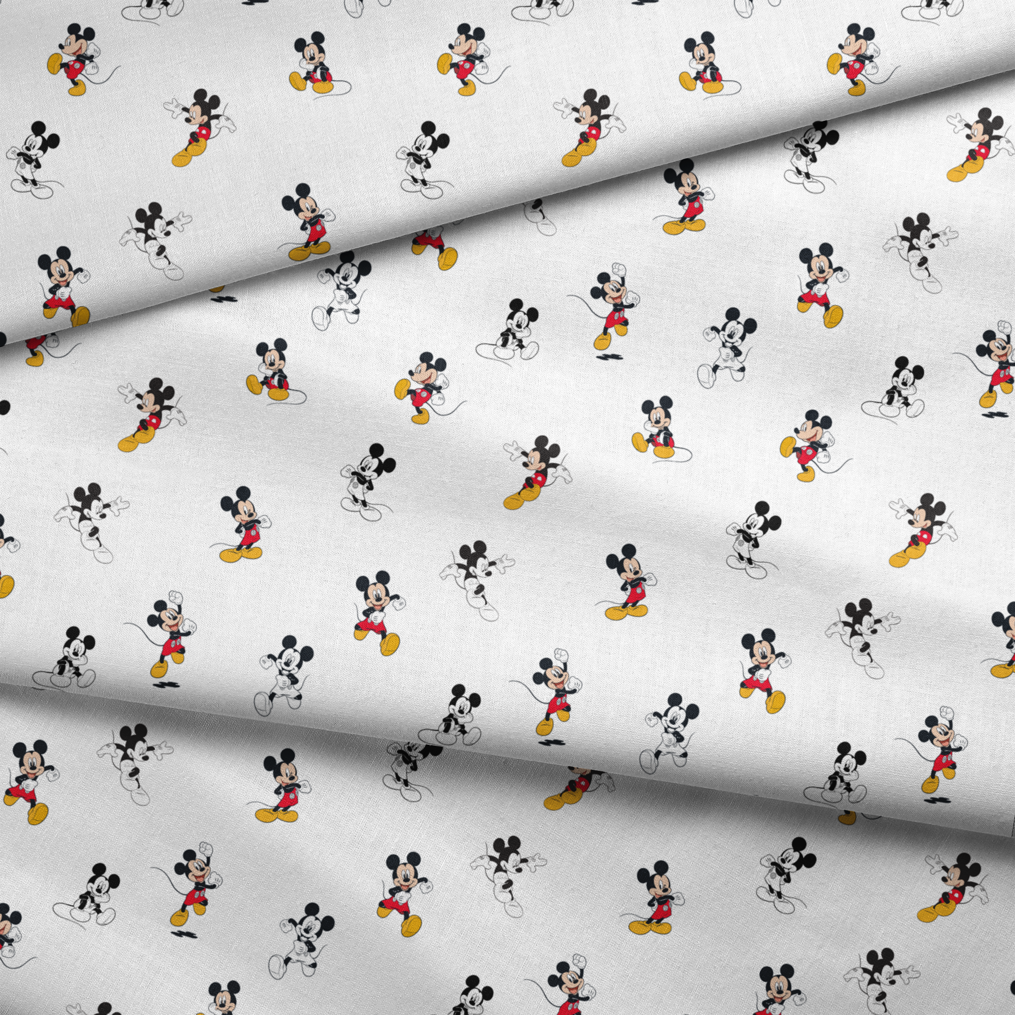 Repeating pattern of Mickey Mouse cartoon characters in various poses on white background fabric fold mockup