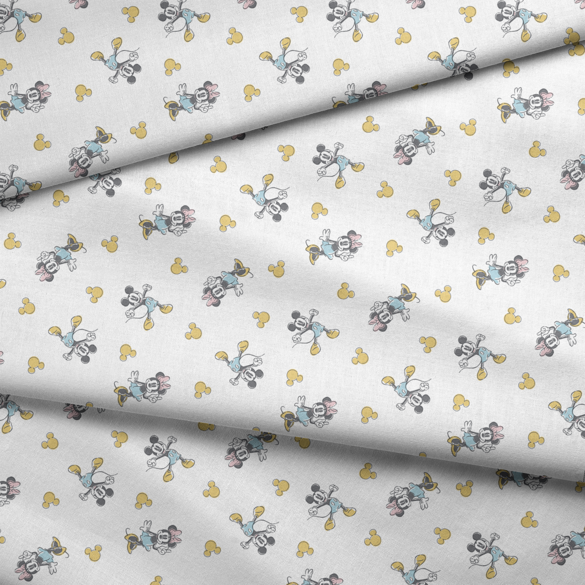 Mickey Mouse characters in light blue outfits scattered on white background with yellow Mickey silhouettes fabric fold mockup