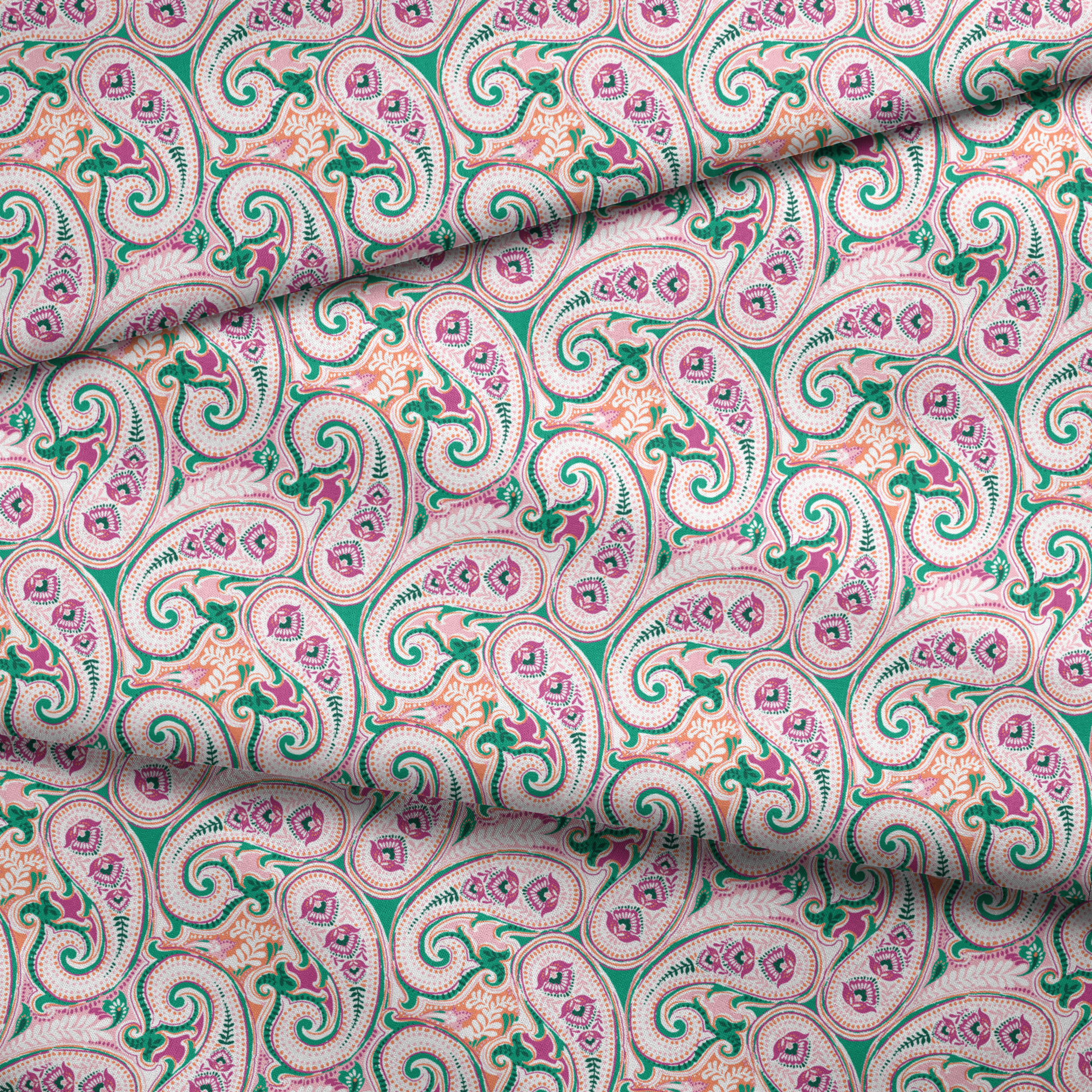 Colorful paisley pattern with swirling teardrop shapes in pink, green, and orange on light background fabric fold mockup