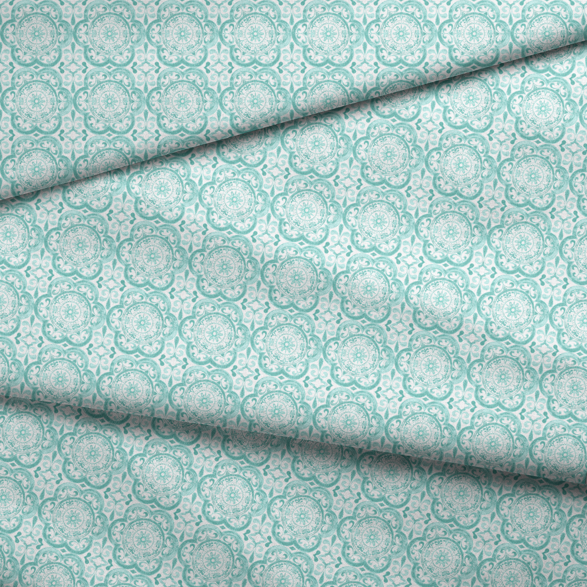 Teal medallion tile-inspired design with intricate floral and scroll details by Nicole Tamarin, from the Squeeze the Day collection. fabric fold mockup