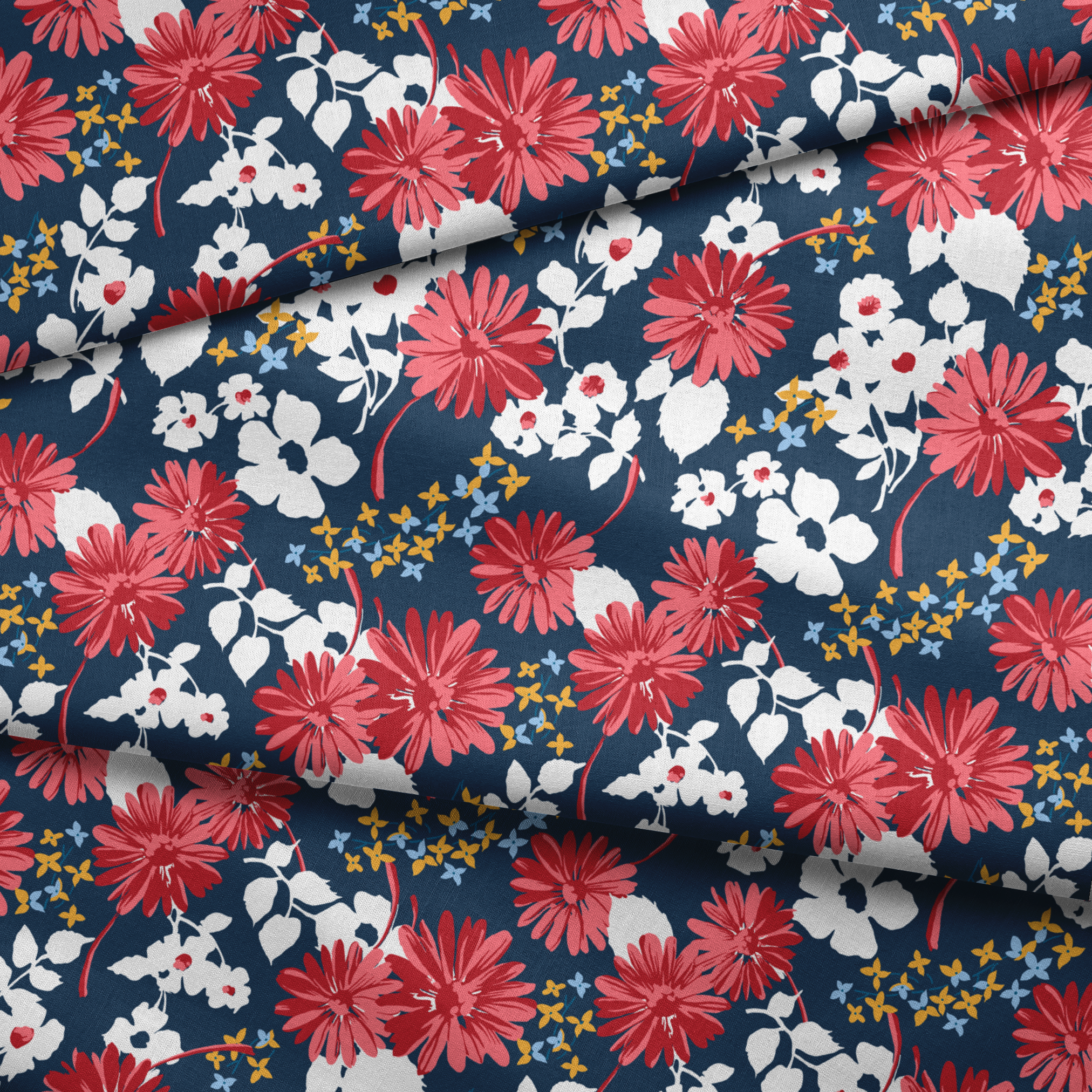 Vibrant floral pattern with red daisies and white flowers on navy background with small gold stars fabric fold mockup