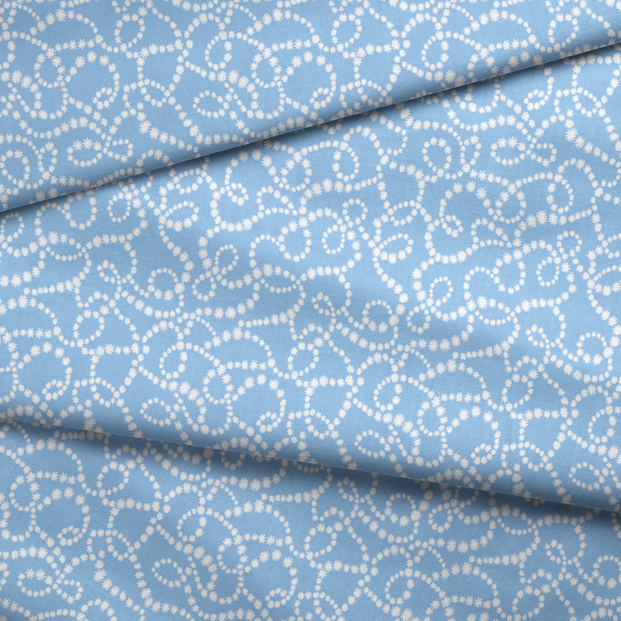 Pale blue background with white dotted swirling pattern resembling strings of pearls or bubbles in abstract curves fabric fold mockup