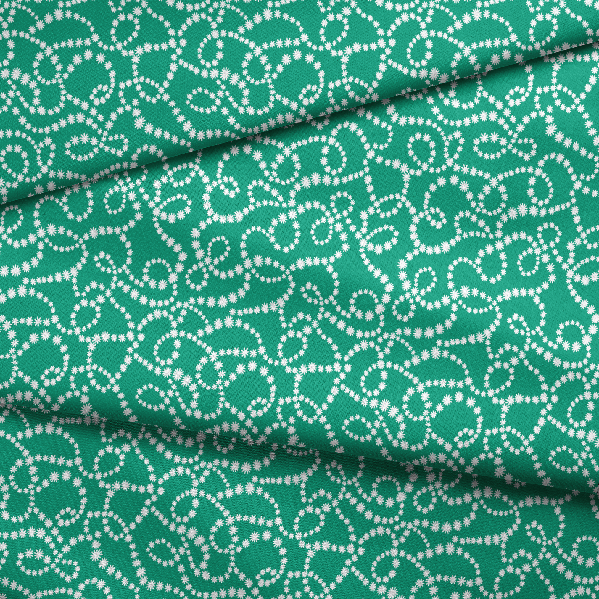 White dotted swirling patterns on green background forming abstract curving lines fabric fold mockup