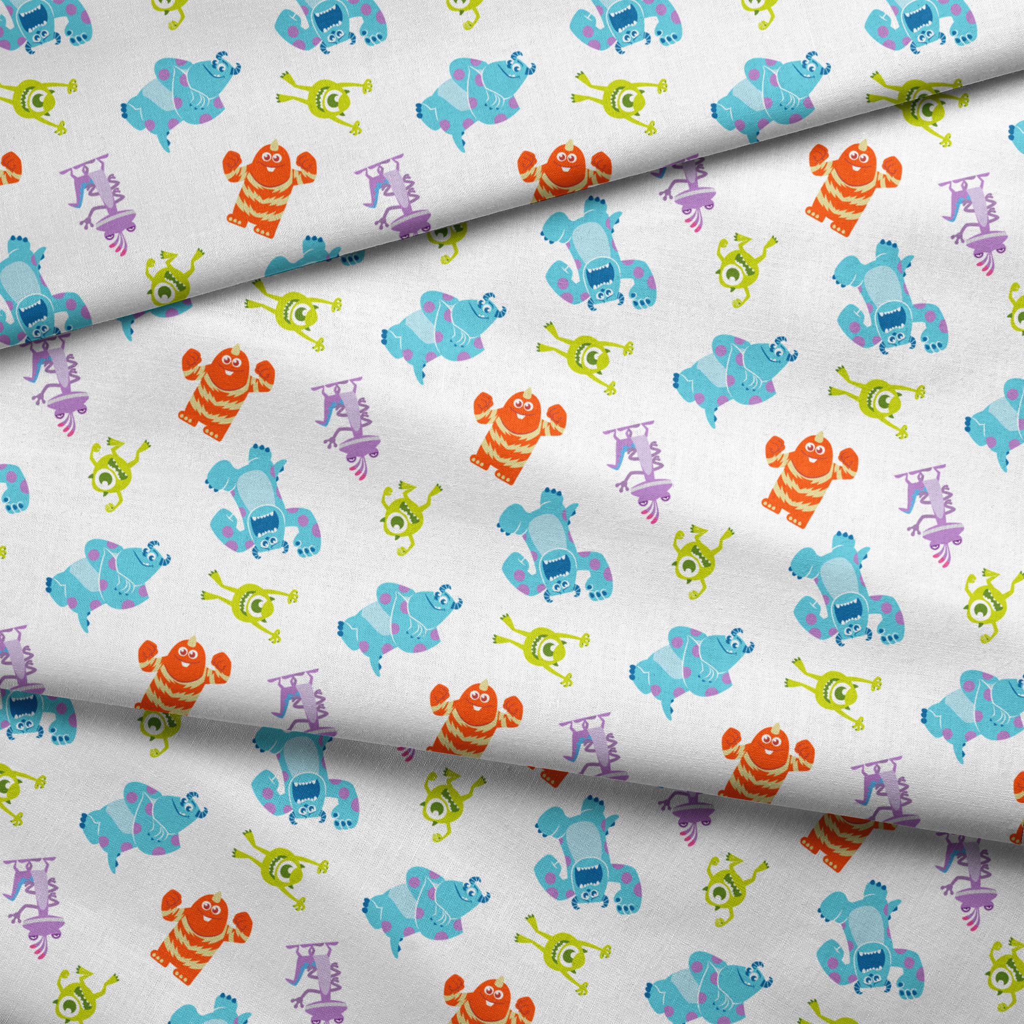 Cartoon monsters pattern with colorful characters - blue, green, purple and orange creatures on white background fabric fold mockup