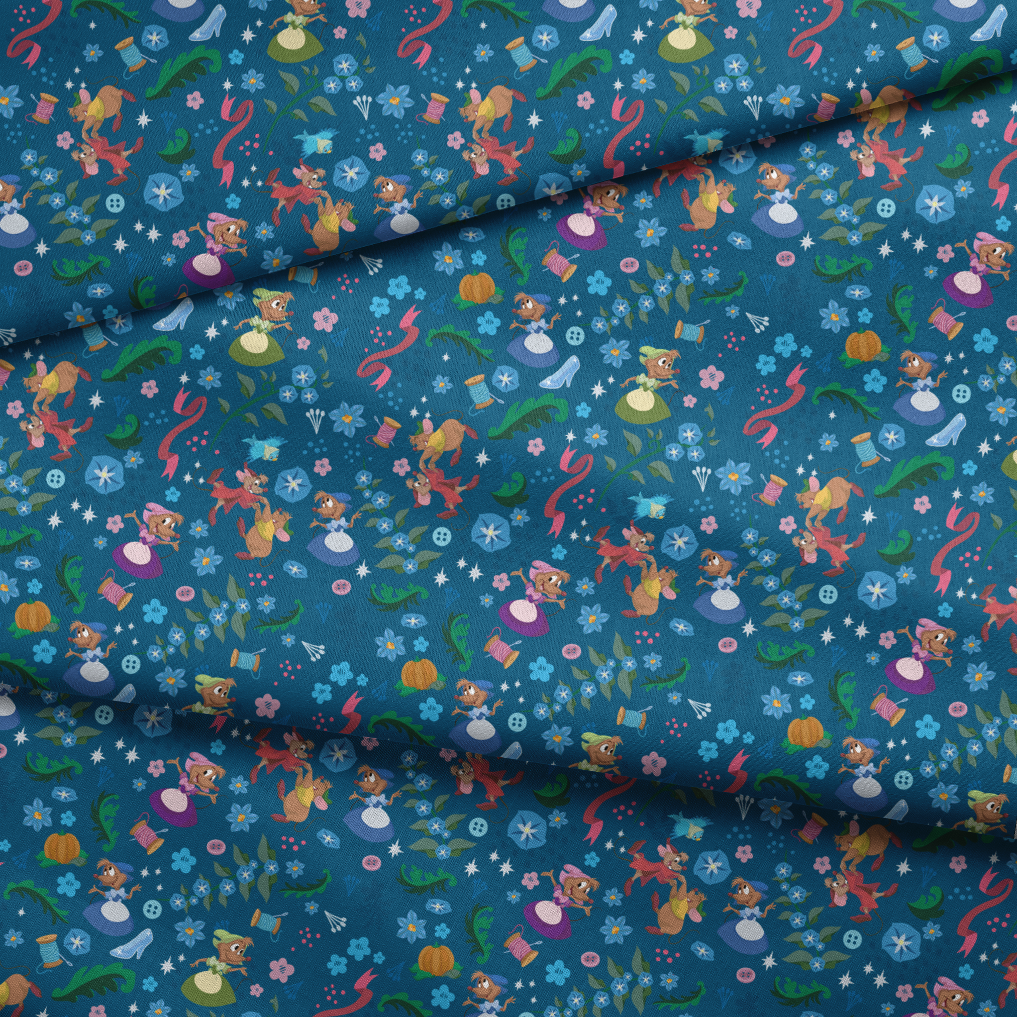 Colorful fairy tale pattern with mice, glass slippers, pumpkins, and floral elements on deep blue background fabric fold mockup