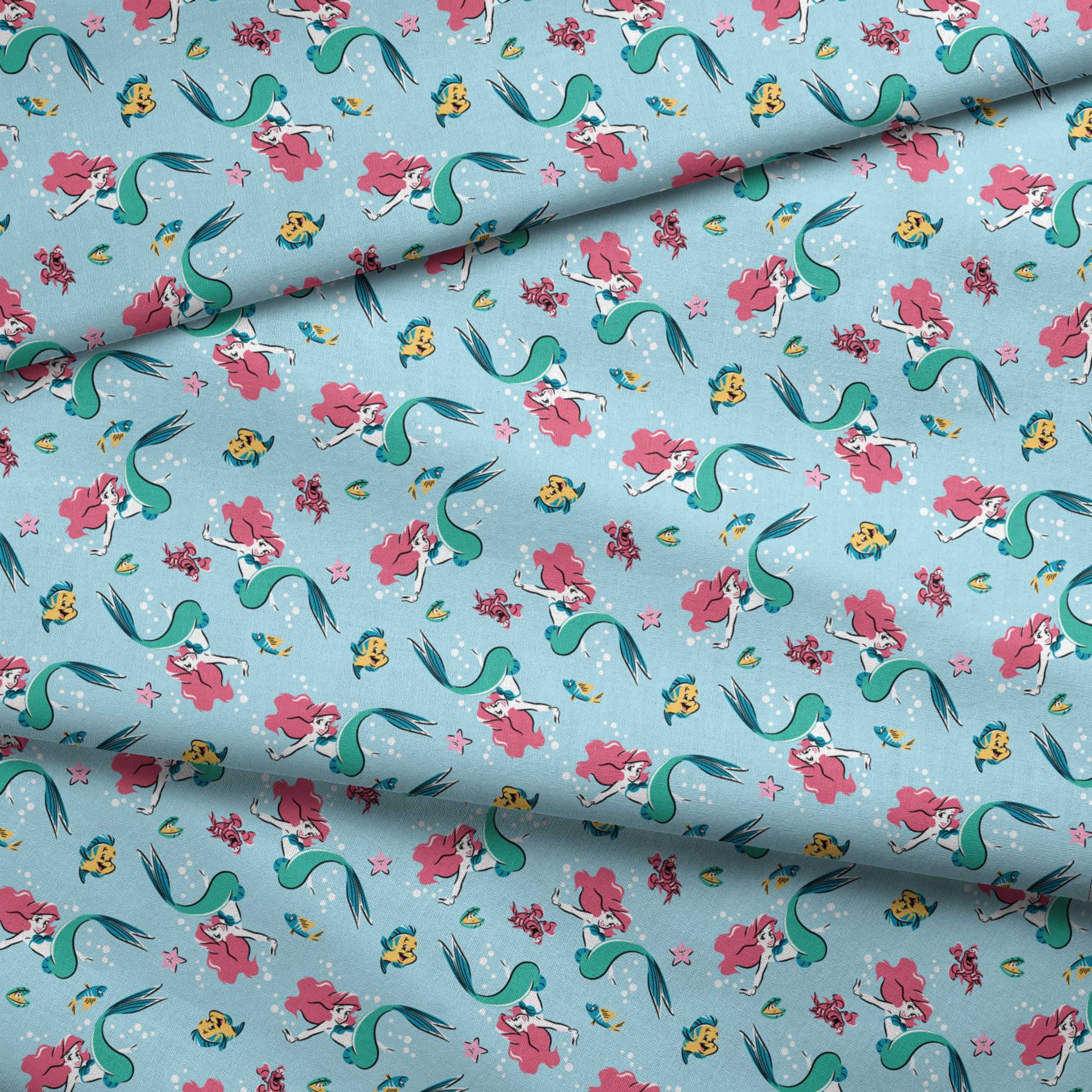 Underwater pattern with colorful mermaids, tropical fish, crabs, and starfish on light blue background fabric fold mockup