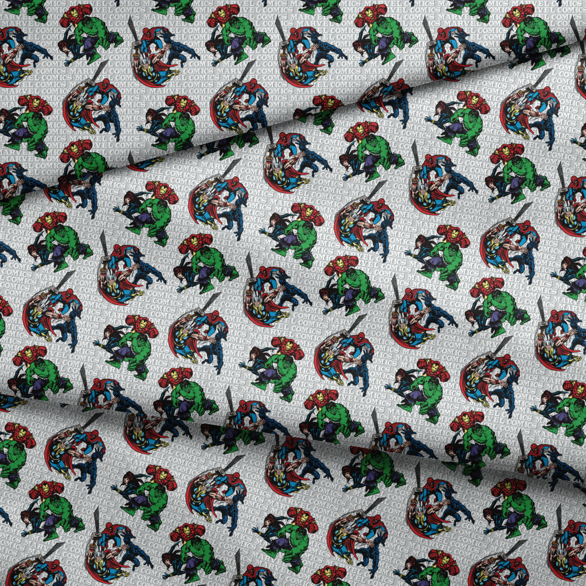 Marvel Comics superheroes pattern with Hulk, Iron Man, Captain America, and Spider-Man on a repeating text background. fabric fold mockup