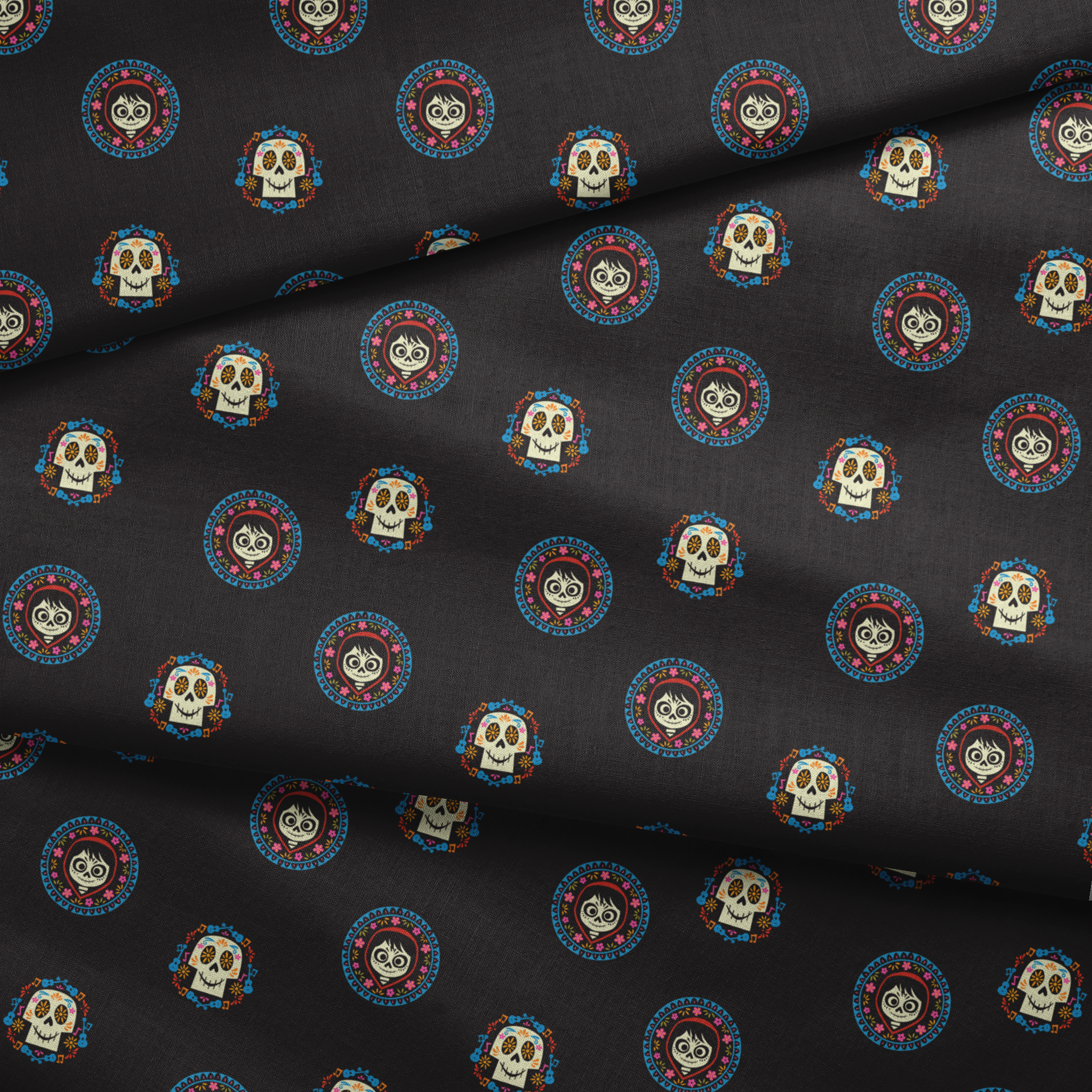 Colorful Coco sugar skull pattern with decorative circular borders on black background fabric fold mockup