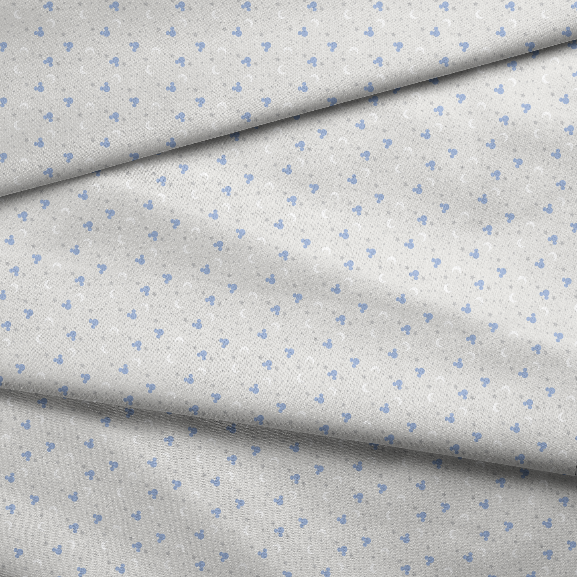 Blue Mickey Mouse silhouettes with white moons and gray stars on light gray background fabric fold mockup