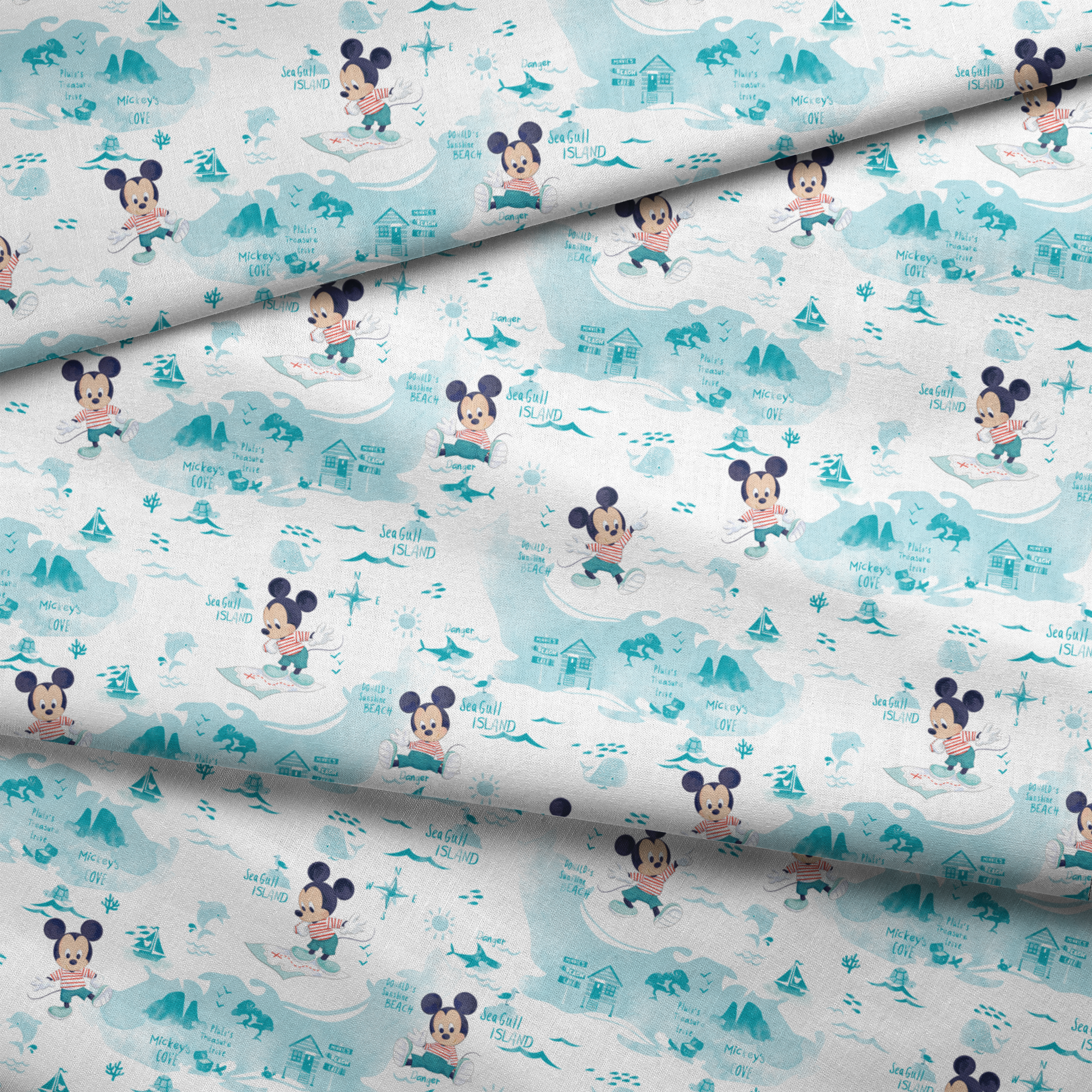 Cartoon Mickey Mouse pattern with turquoise ocean elements, sharks, waves, and "Safari" text fabric fold mockup