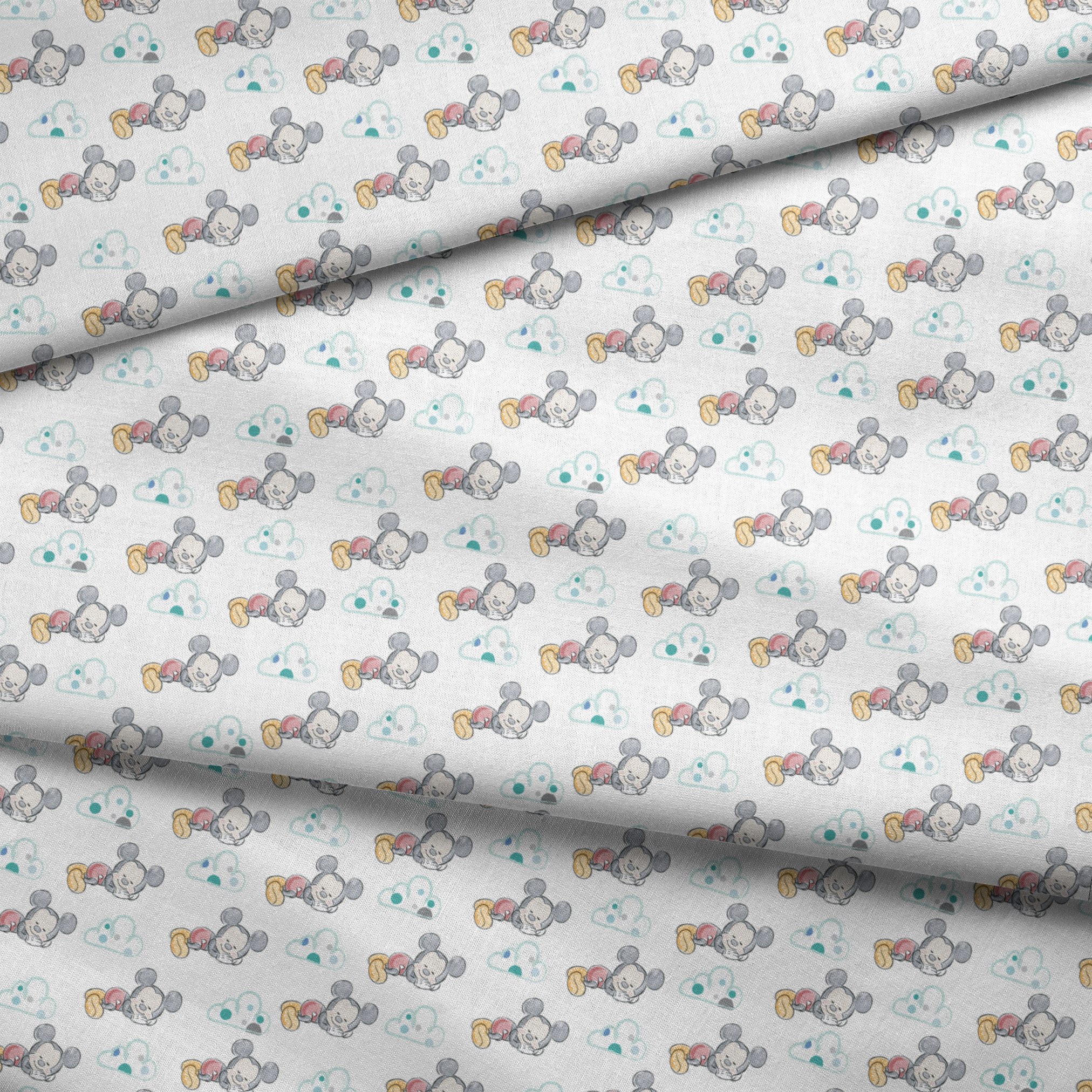 Cute cartoon mouse characters sleeping peacefully on white background with mint green clouds pattern fabric fold mockup