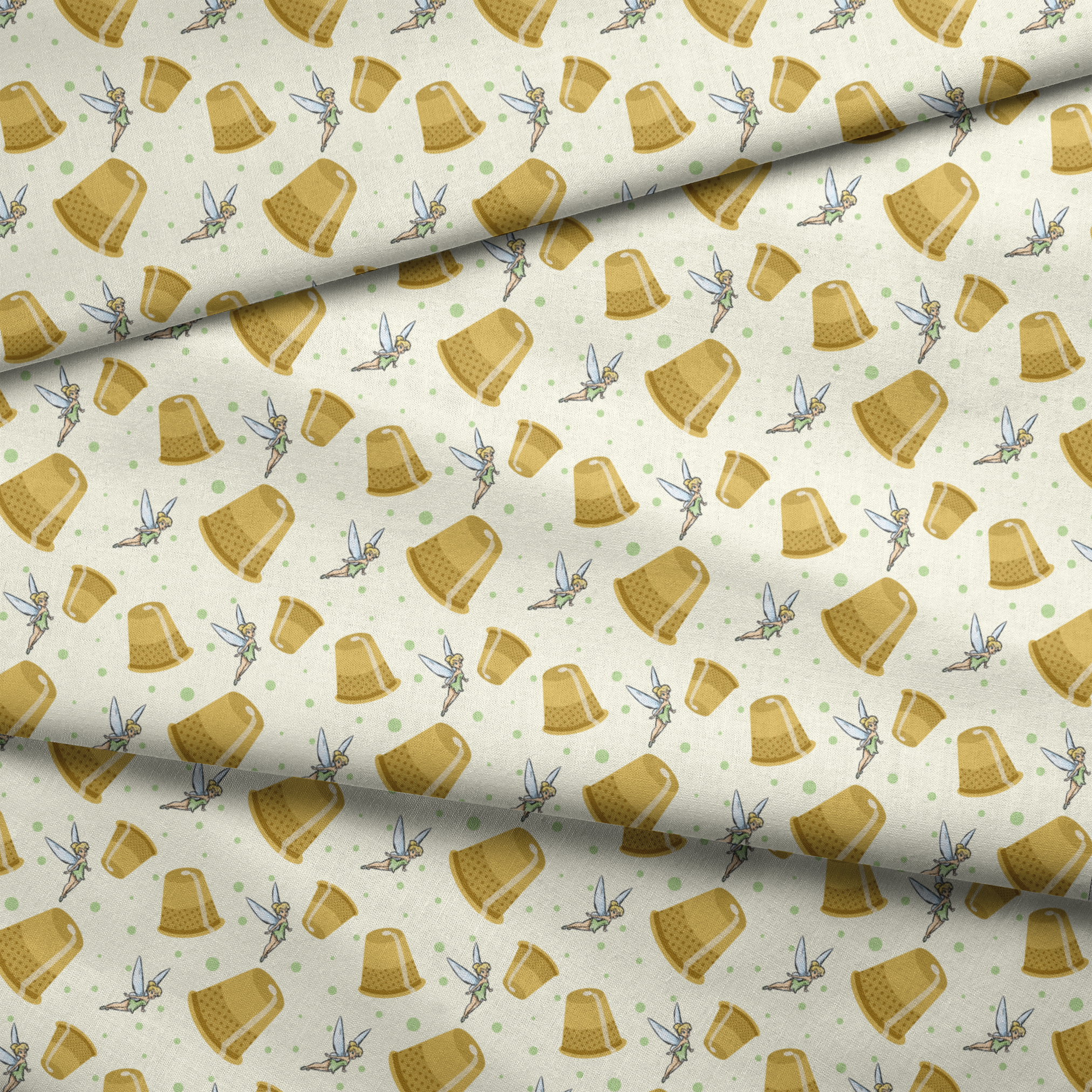 A pattern featuring Tinkerbell fairy with golden thimbles on a pale background with green dots. fabric fold mockup