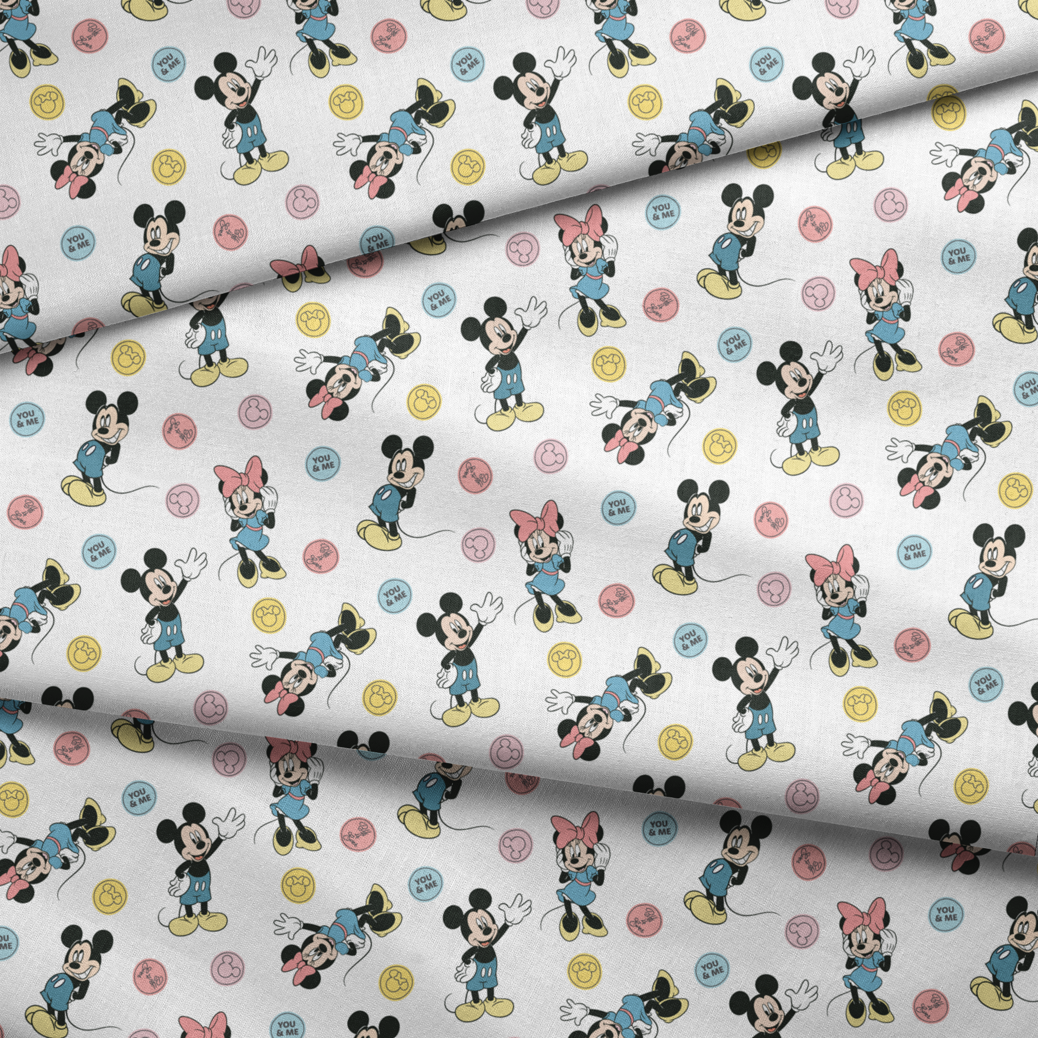 Mickey Mouse and Minnie Mouse cartoon pattern with colorful circles containing phrases on white background. fabric fold mockup