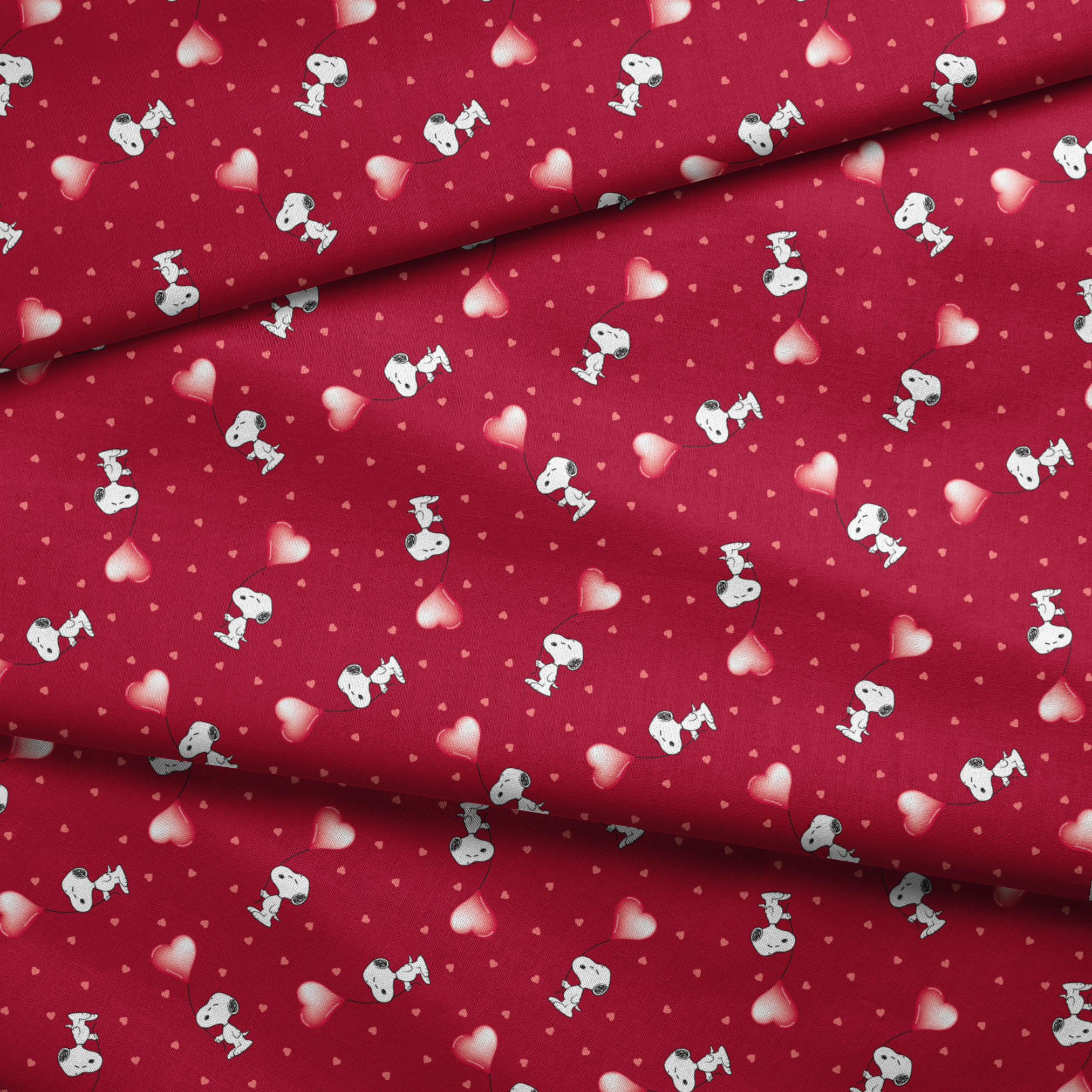 Snoopy scattered on red background with pink and white hearts pattern fabric fold mockup
