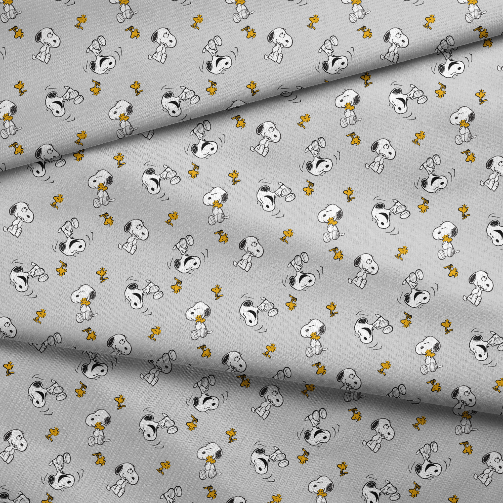 Pattern of Peanut's Snoopy and Woodstock on light gray background fabric fold mockup