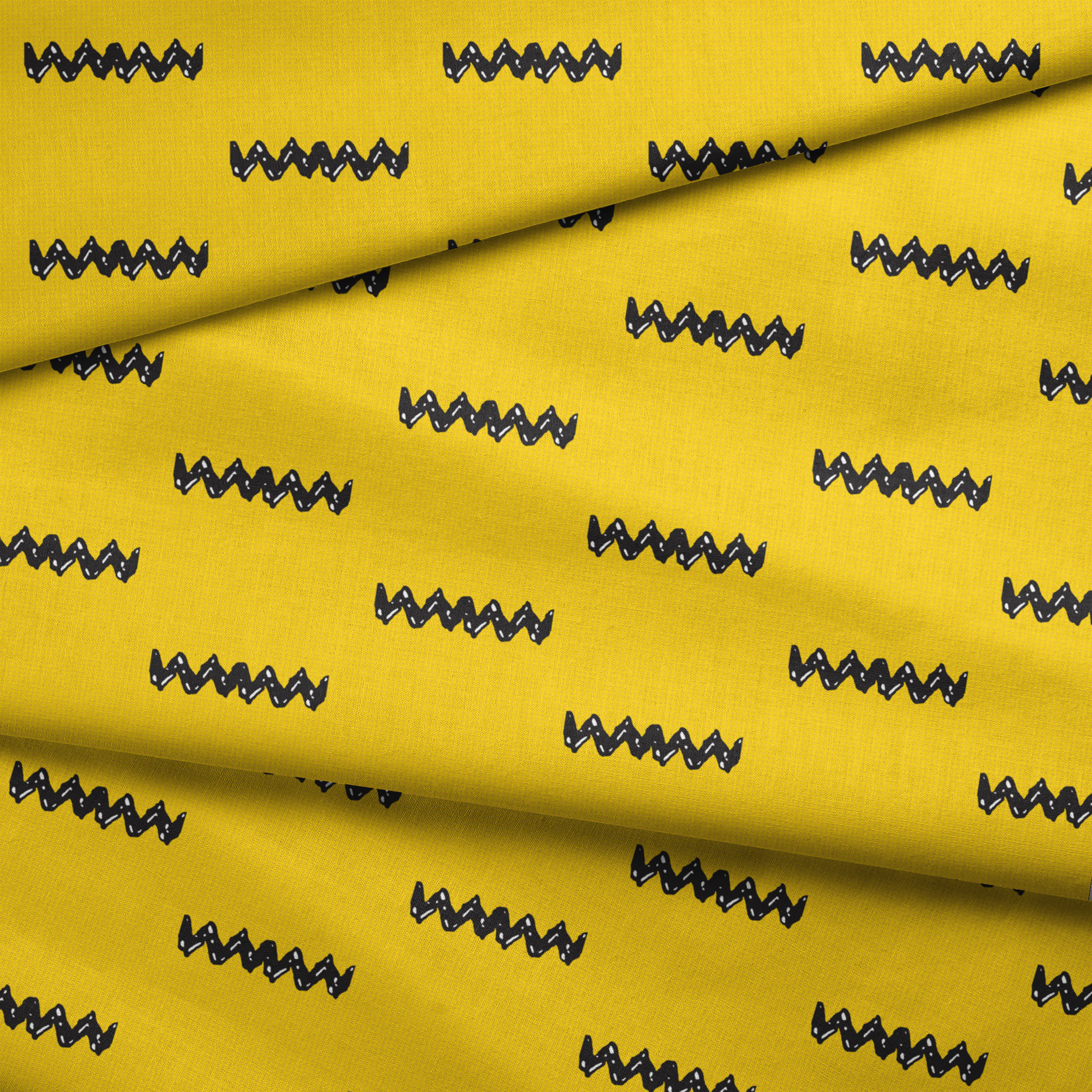 Black Charlie Brown zigzag patterns arranged in four rows against a bright yellow textured background fabric fold mockup