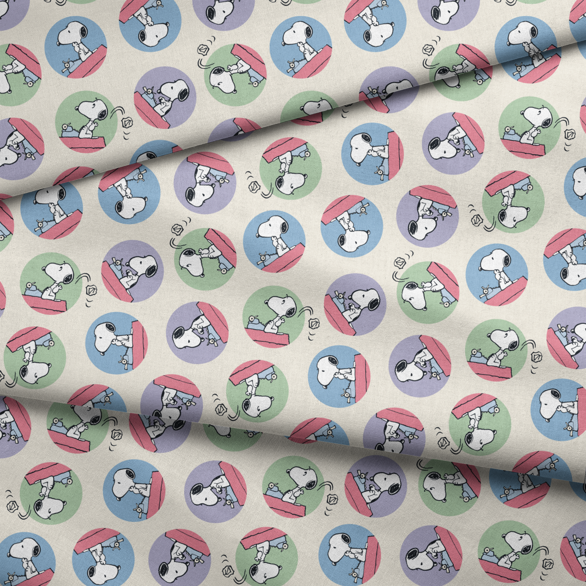 Cartoon Snoopy pattern with the beagle character in circular frames of blue, green, and purple backgrounds fabric fold mockup