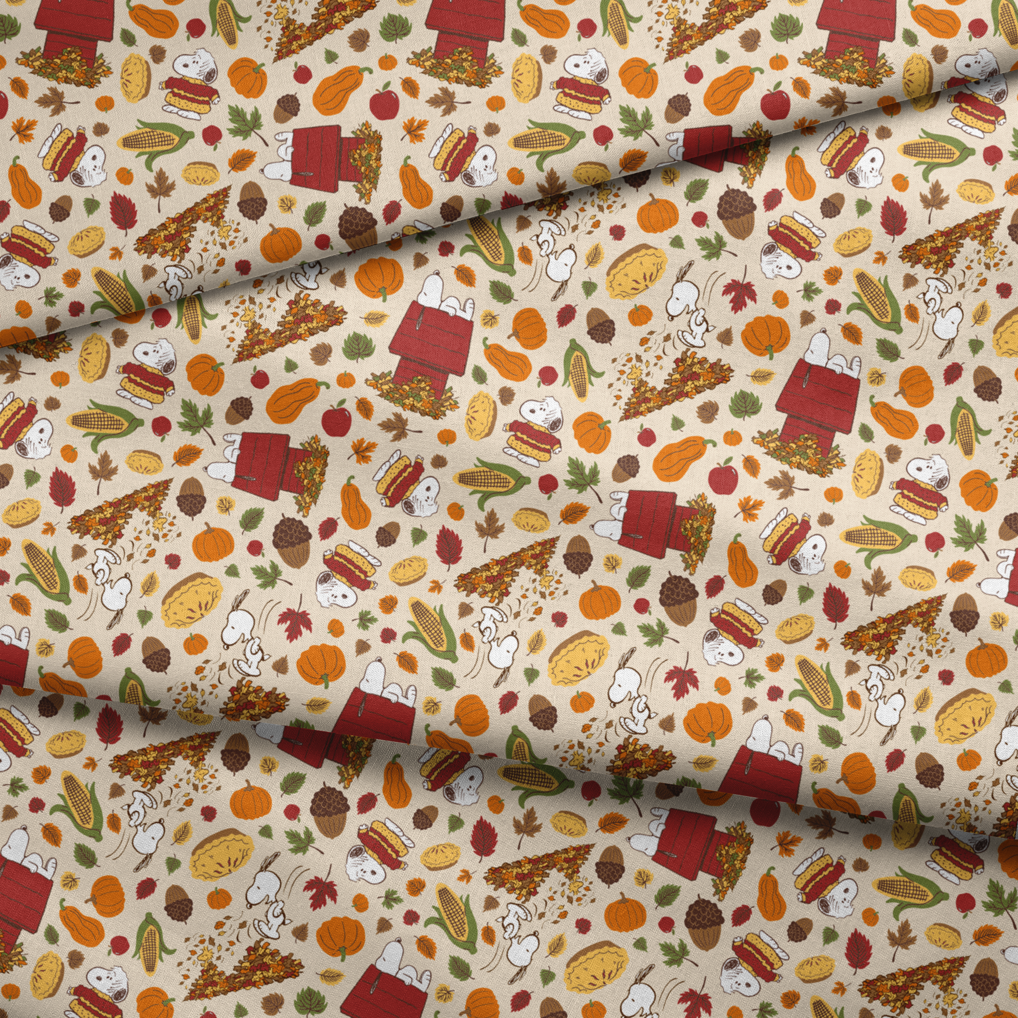 Fall themed pattern with Snoopy, red doghouses, pumpkins, corn, sandwiches, and autumn leaves on cream background fabric fold mockup