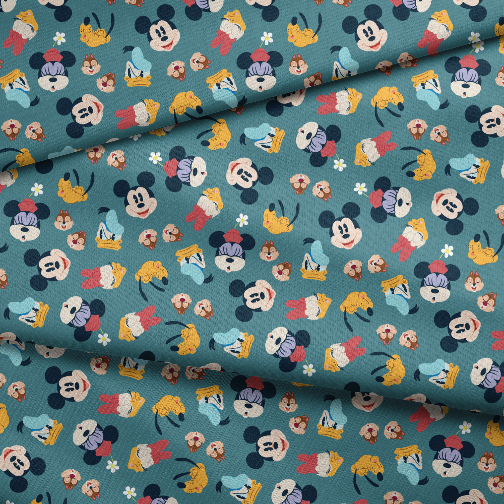 Disney cartoon characters pattern with Mickey Mouse, Donald Duck, and Pluto on teal background with small flowers fabric fold mockup