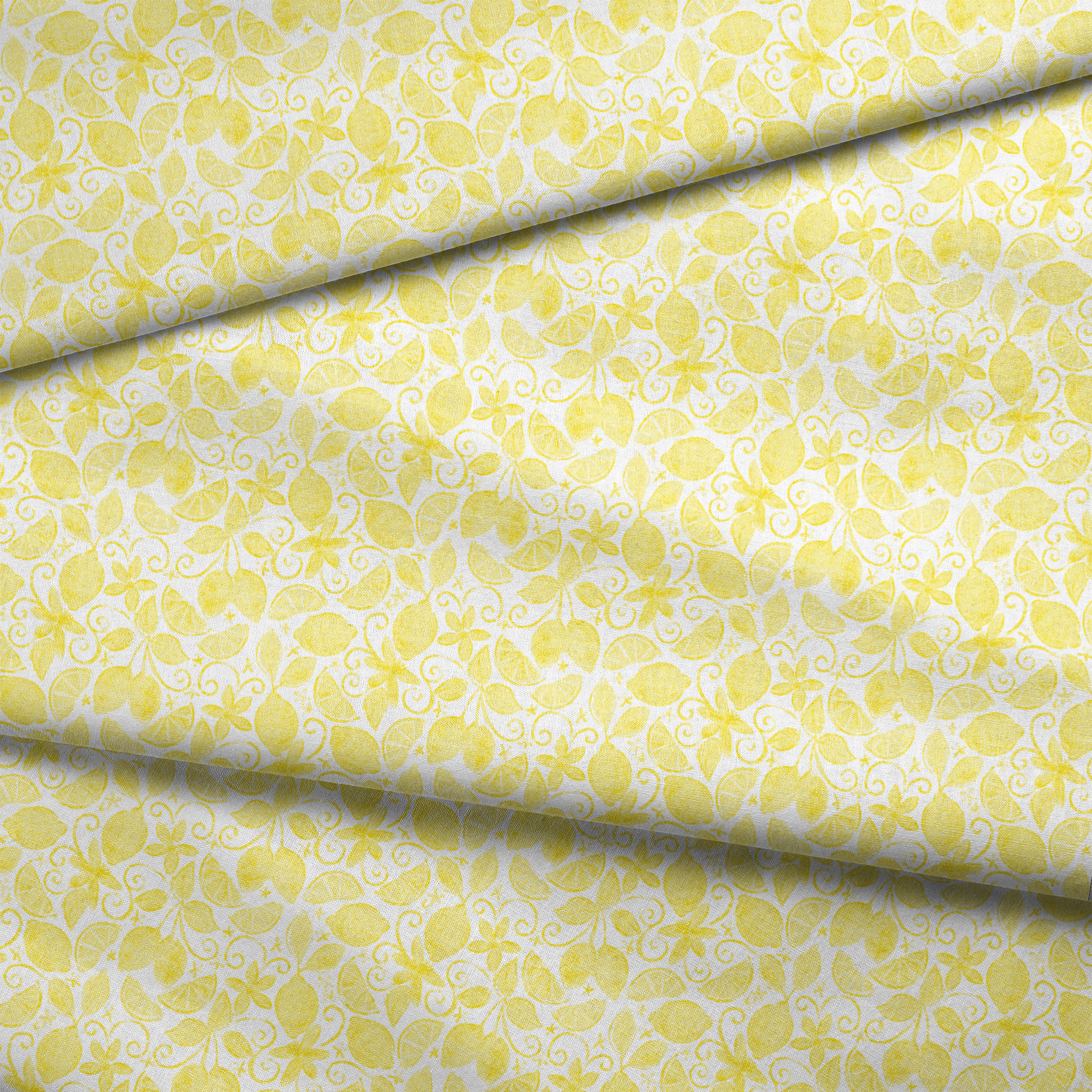 Yellow lemon pattern by Nicole Tamarin with sliced lemons, leaves, and swirls on a white background fabric fold mockup