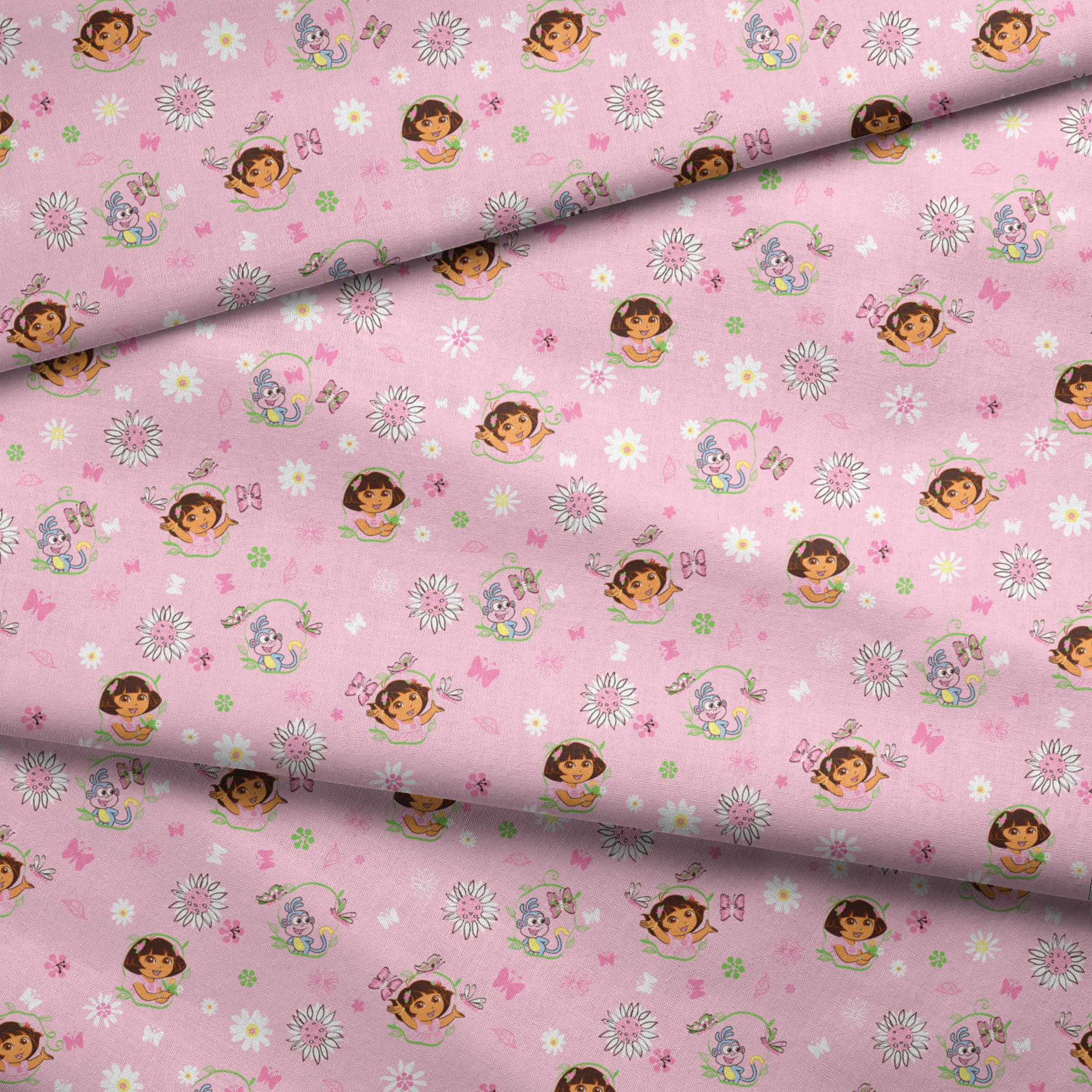 Pink background with Dora the Explorer characters, white daisies and purple butterflies scattered throughout fabric fold mockup
