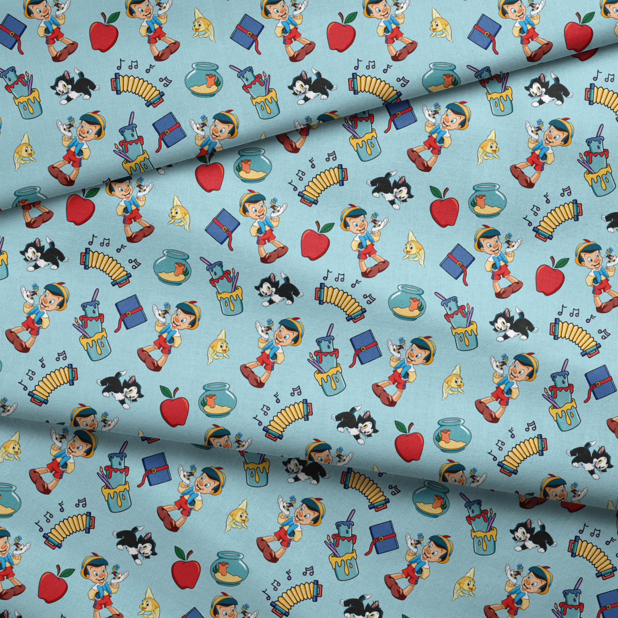 Cartoon pattern with wooden puppets, red apples, musical notes, goldfish bowls, cats, and books on light blue background fabric fold mockup