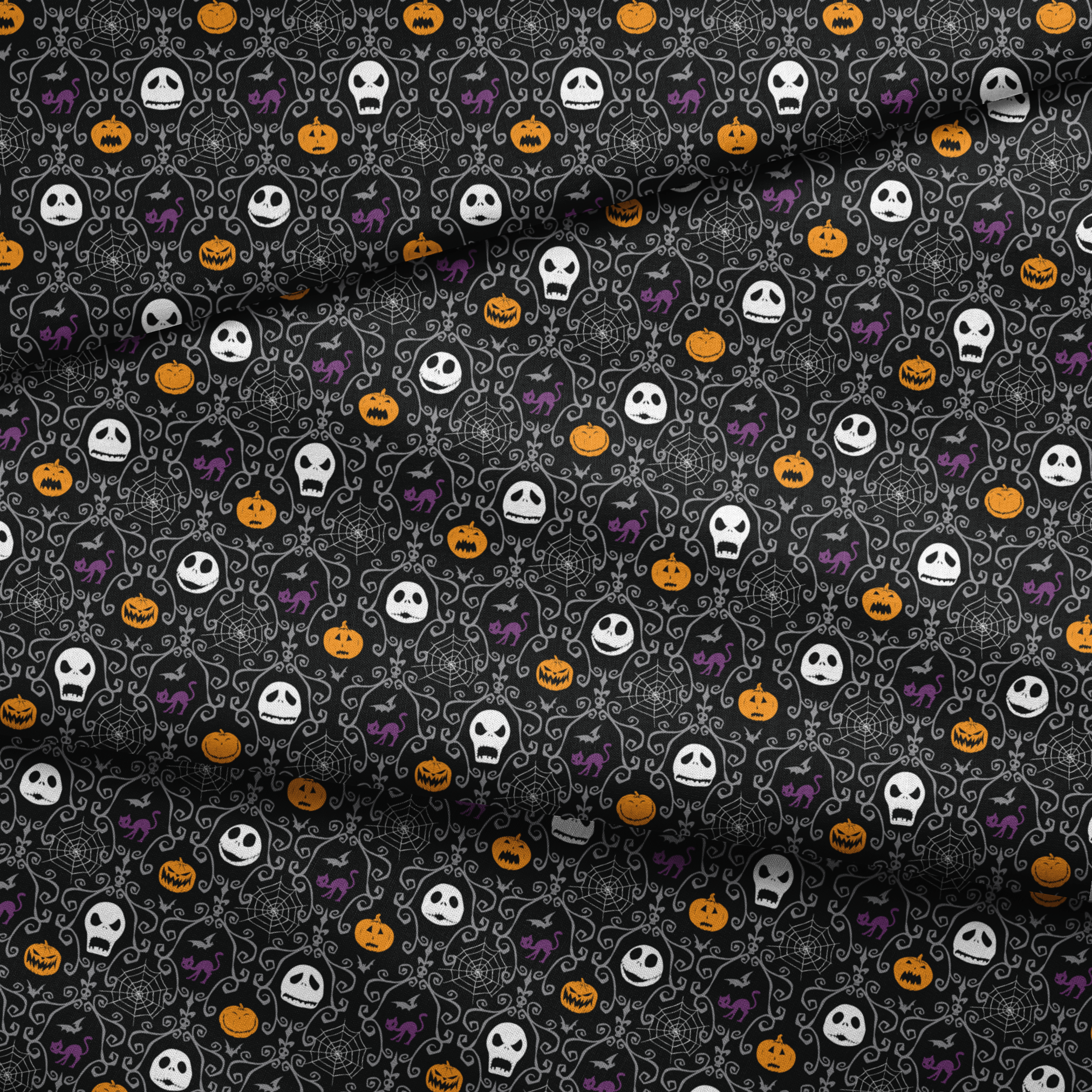 Nightmare Before Christmas pattern with skulls, pumpkins, bats and ornate swirls on black background fabric fold mockup
