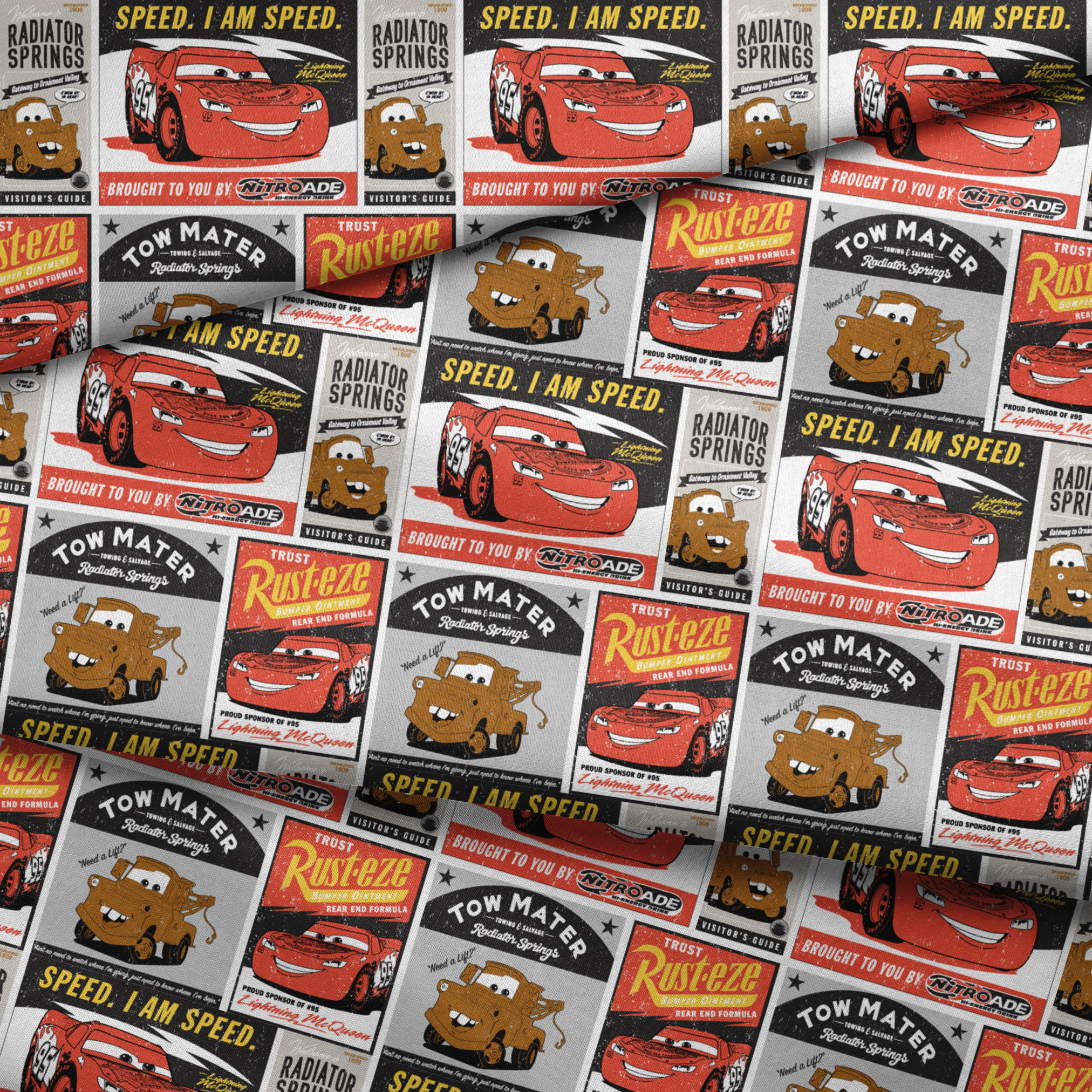 Cars merchandise posters featuring red race car saying "Speed. I am speed." and brown tow truck character with "Tow Mater" in vintage advertising style fabric fold mockup