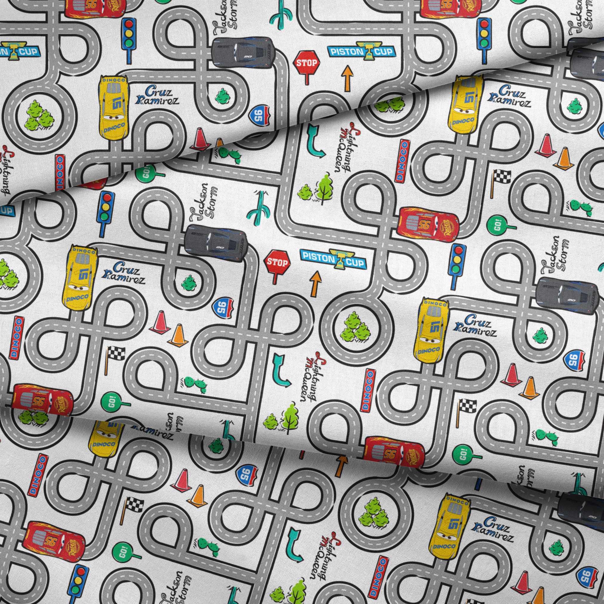Cartoon road map with cars, traffic signs, and "Cruz Ramirez" label on winding gray streets fabric fold mockup