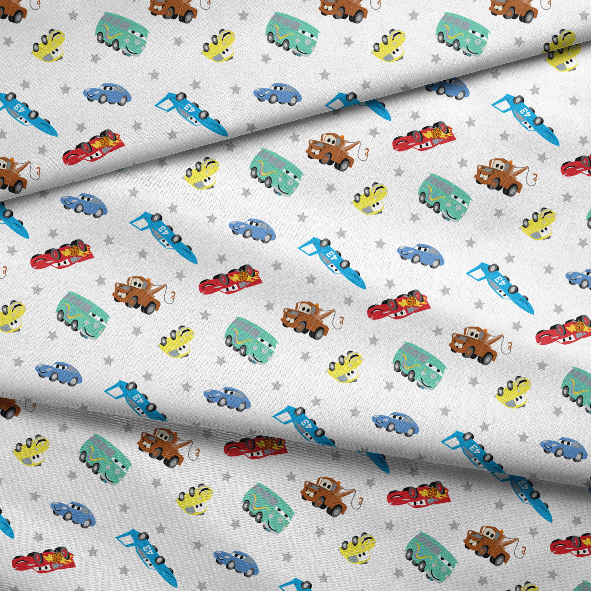 Cartoon vehicles pattern with colorful cars, trucks, and racing cars on white background with gray stars fabric fold mockup