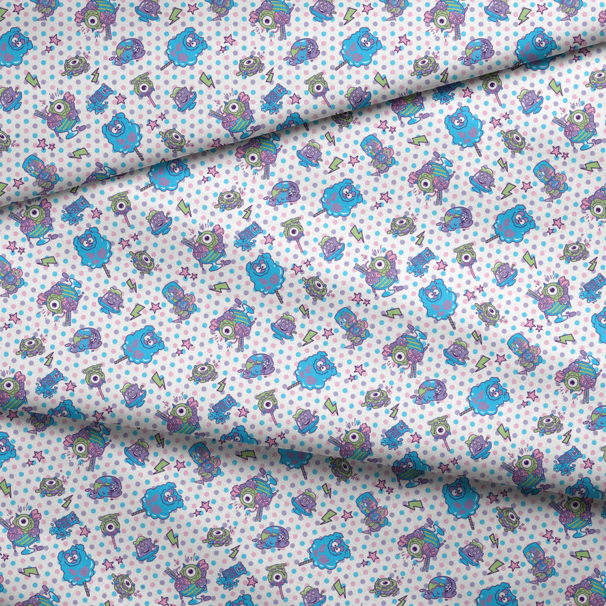 Monsters Inc inspired desserts, stars and lightning bolts on polka dot background fabric fold mockup