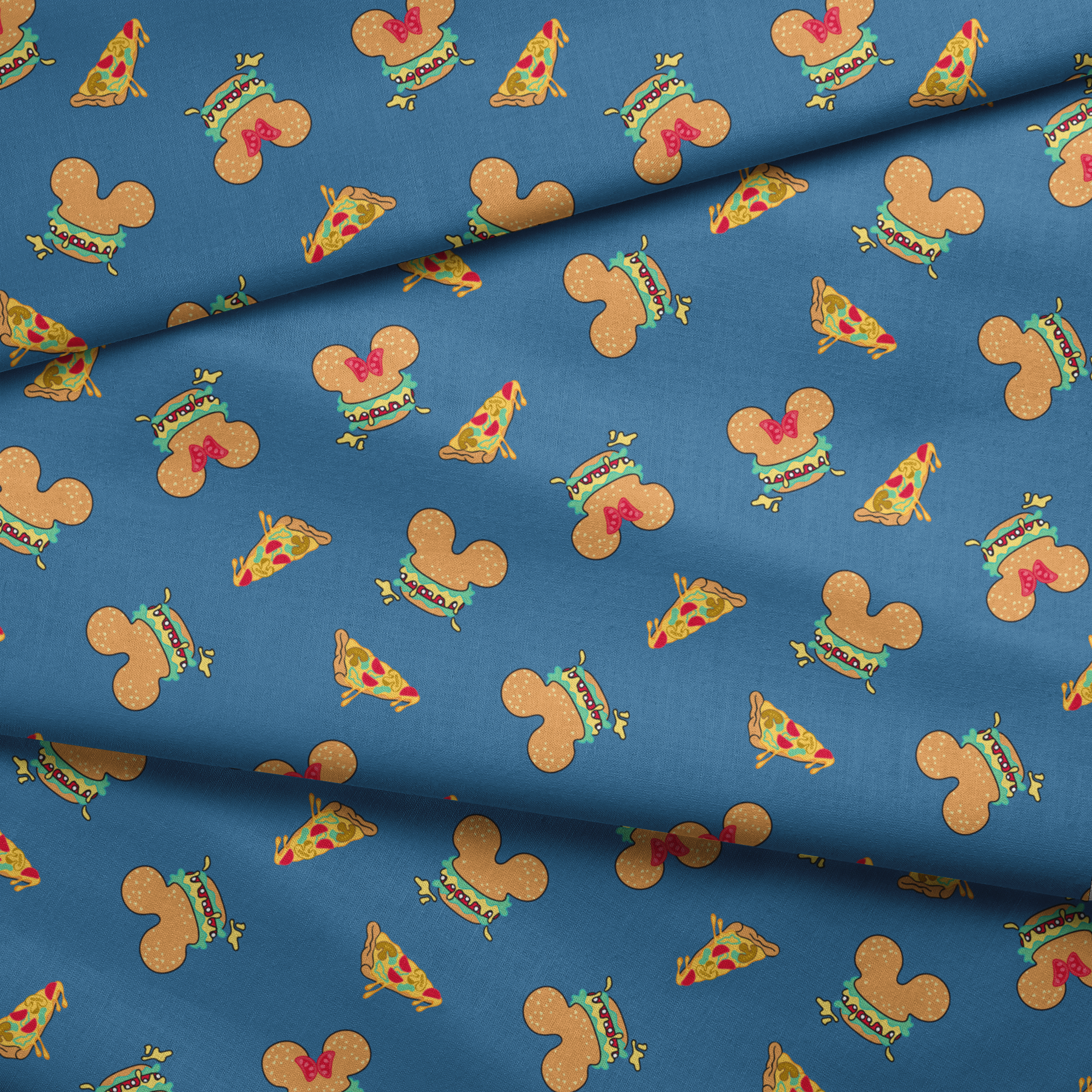 Pattern of Disney-inspired food items - hot dogs and pizza slices on blue background fabric fold mockup