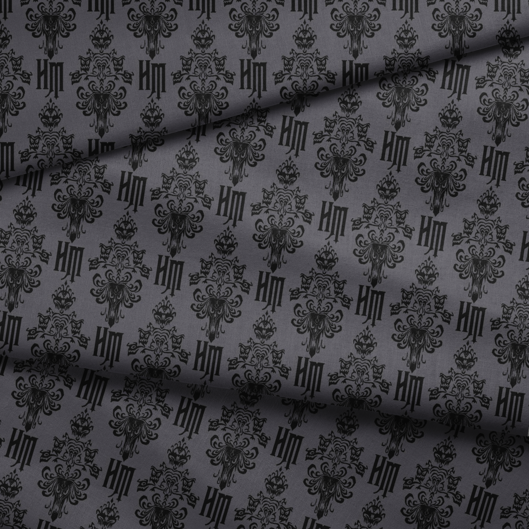 Dark gray background with black ornate damask pattern featuring decorative flourishes and monogram elements fabric fold mockup