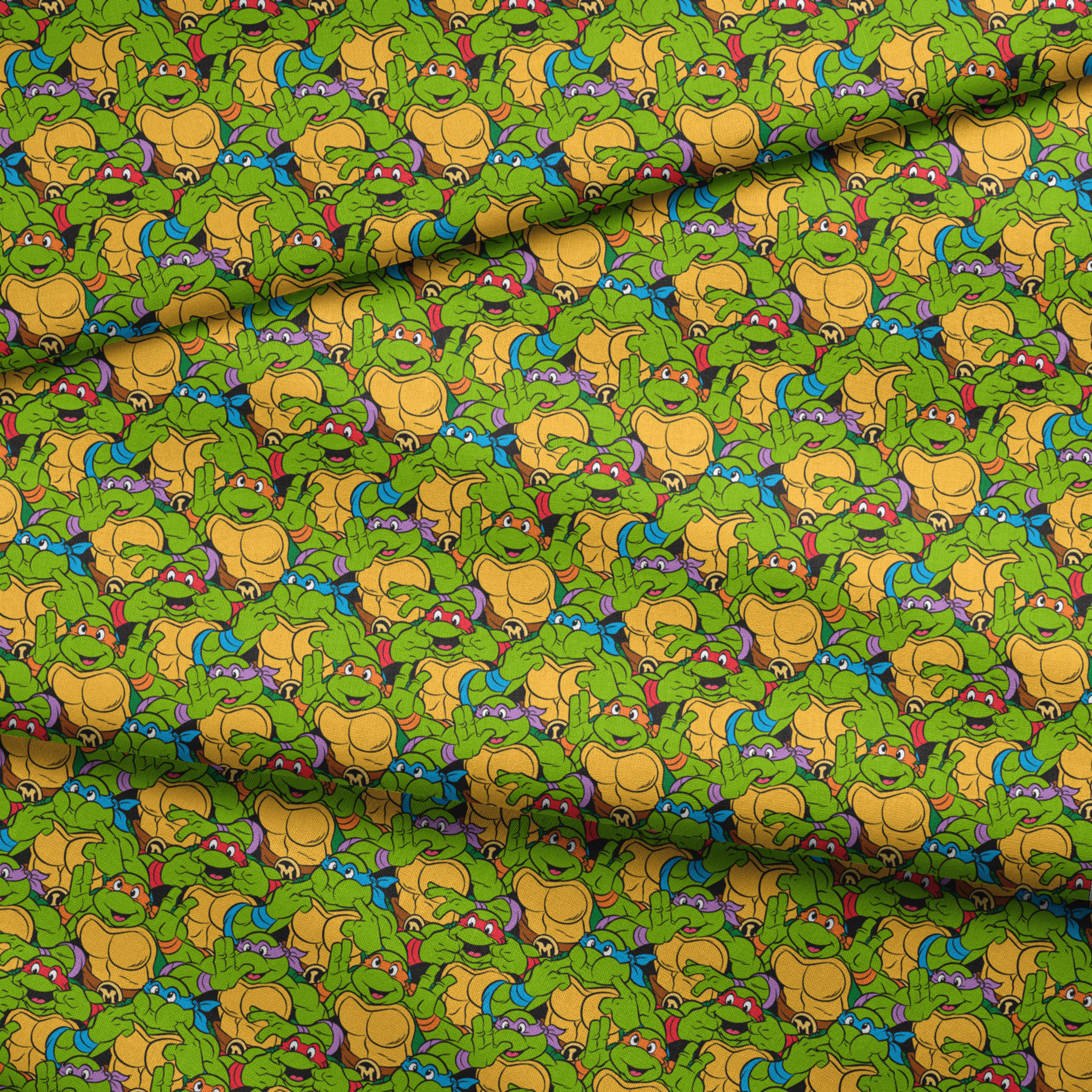 Colorful pattern of cartoon Teenage Mutant Ninja Turtles with green skin and yellow shells fabric fold mockup