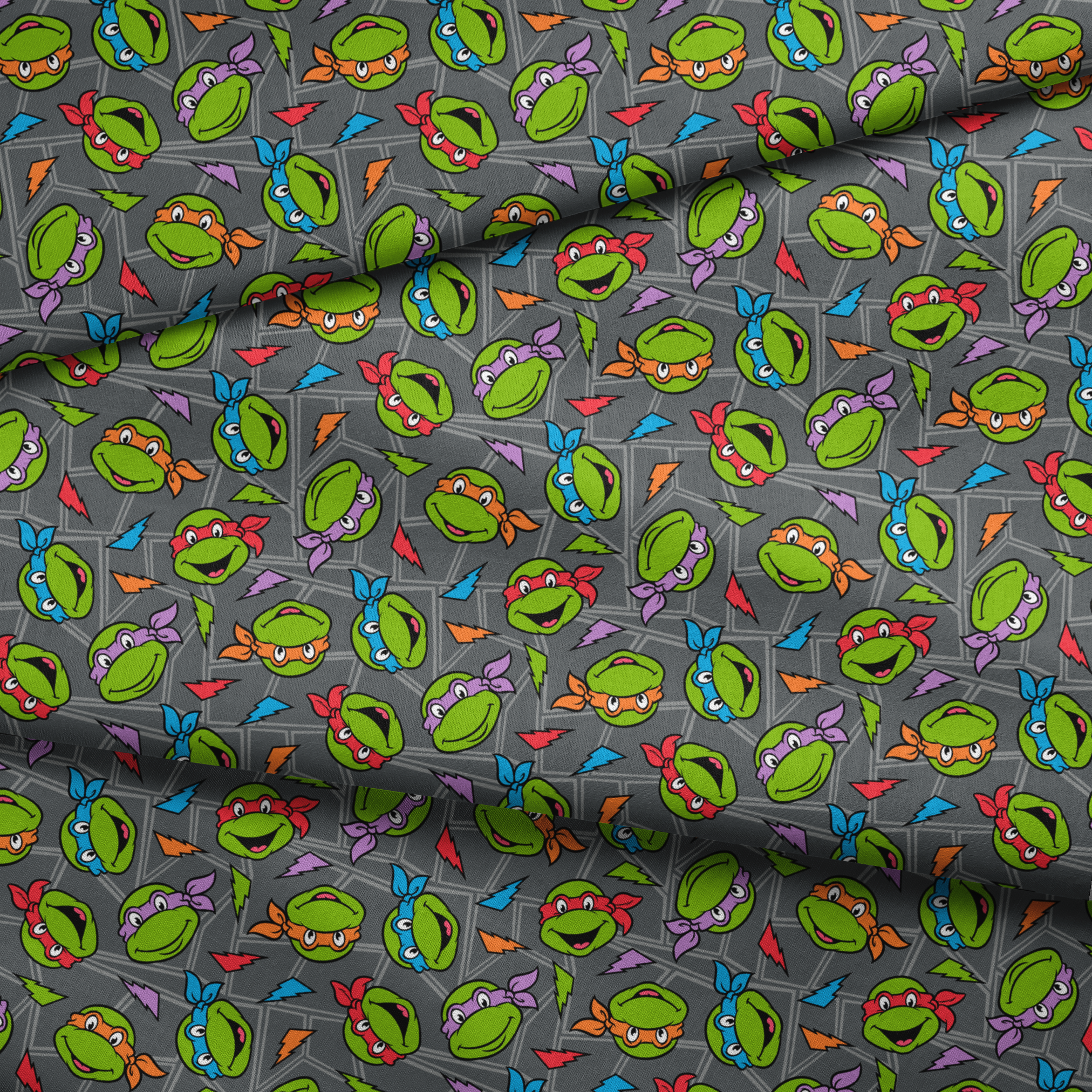 Colorful pattern of Teenage Mutant Ninja Turtles faces with red, orange, blue, and purple masks on grey background. fabric fold mockup