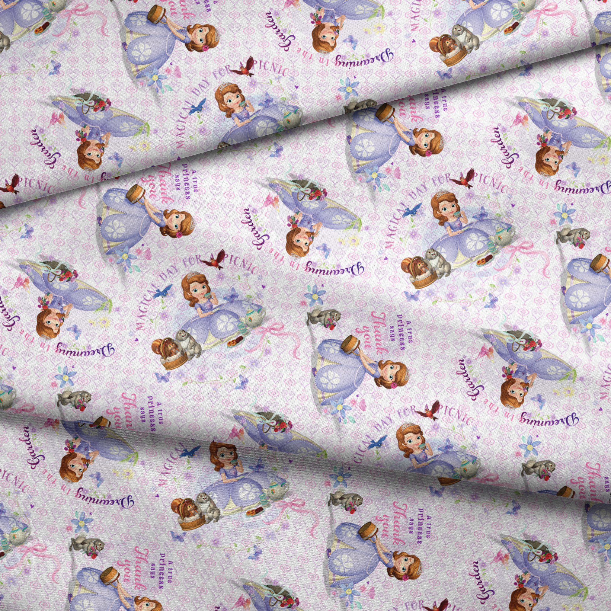 Disney Sofia the First Princess-themed pattern with characters in purple dresses, crowns, and the text "Beautiful Princess" on light purple background fabric fold mockup