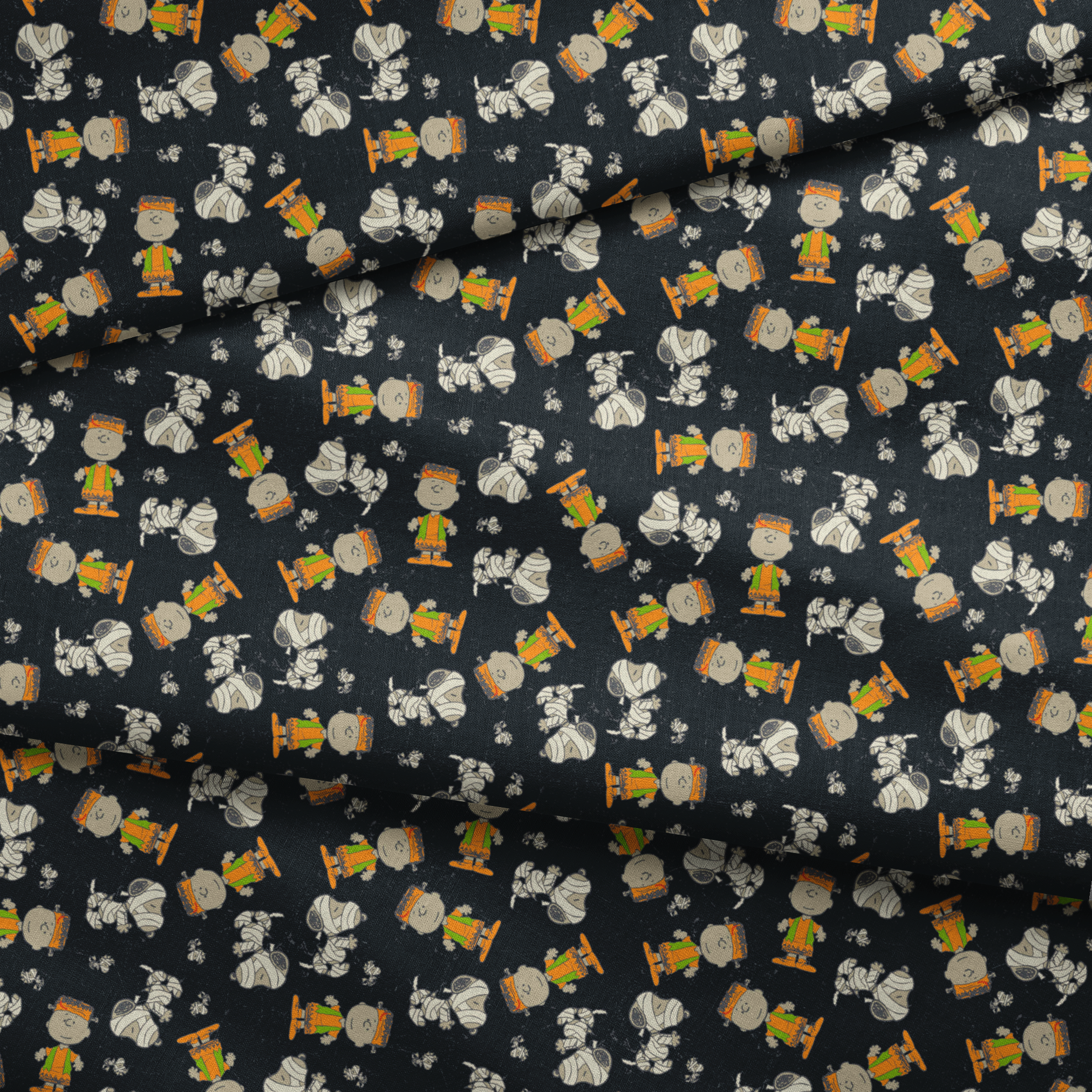 Peanuts characters pattern on black background featuring Snoopy and Charlie Brown in fall outfits fabric fold mockup