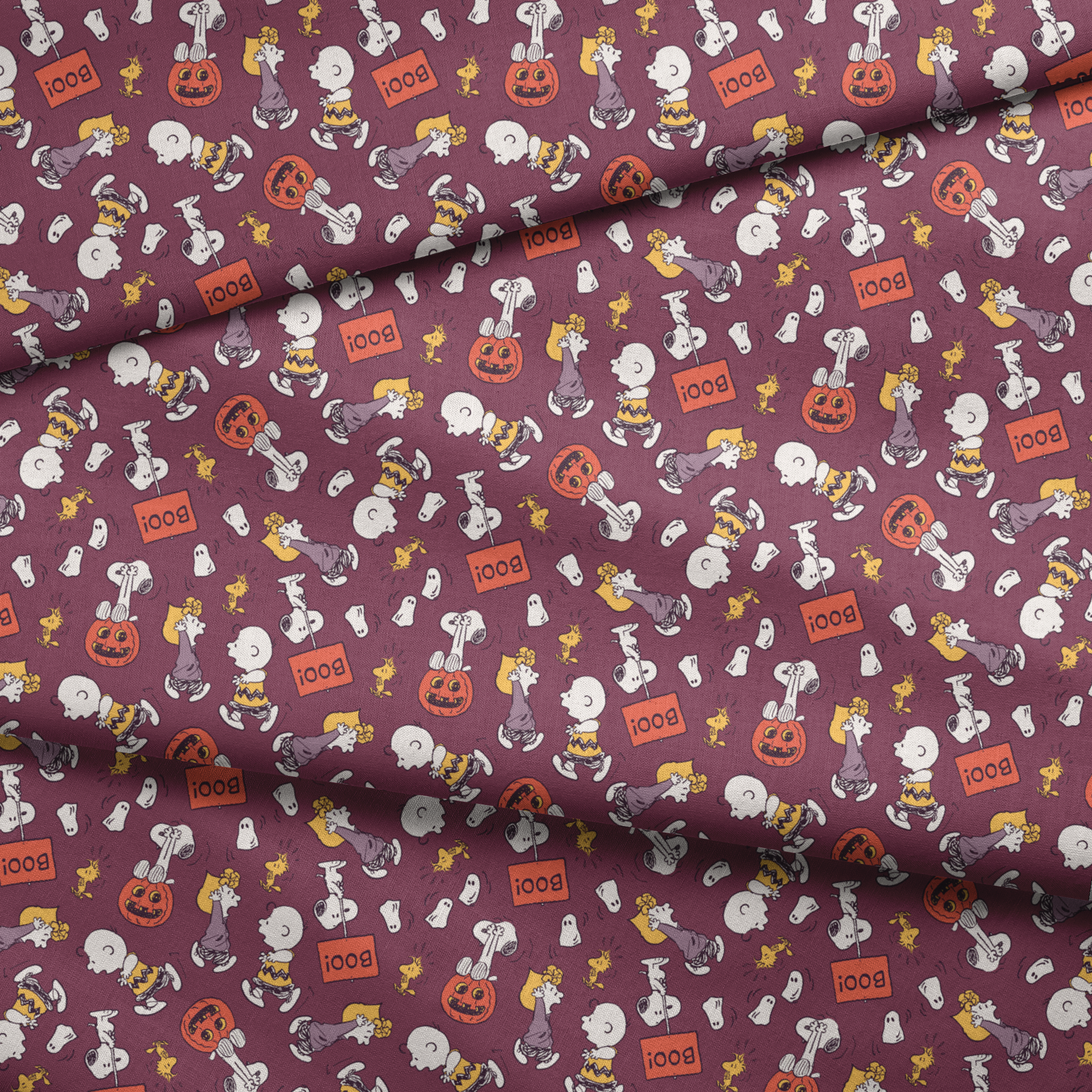 Snoopy and Woodstock Halloween pattern on purple background with pumpkins, ghosts, and "boo!" text fabric fold mockup