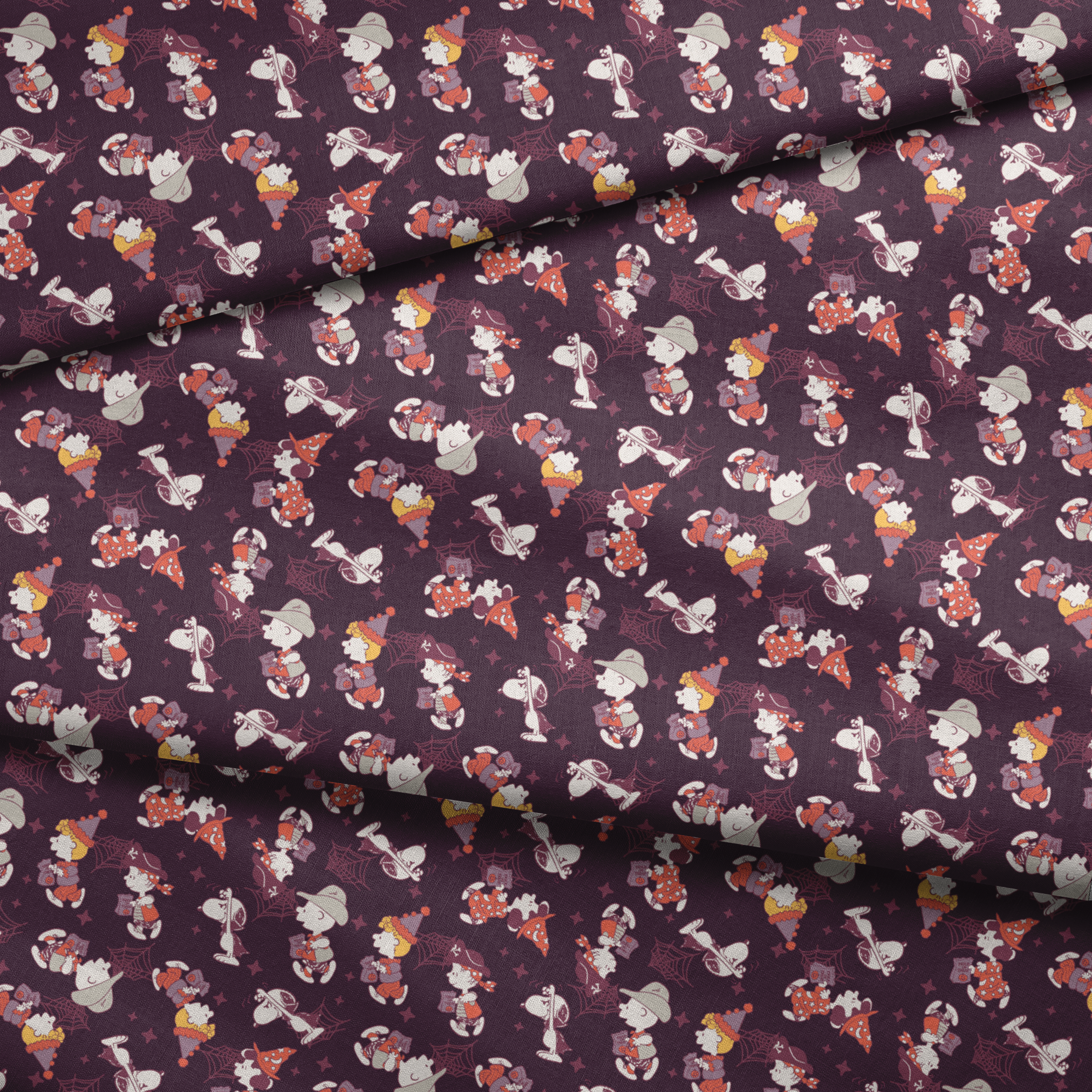 Snoopy and Peanuts characters in Halloween costumes scattered on dark purple background fabric fold mockup
