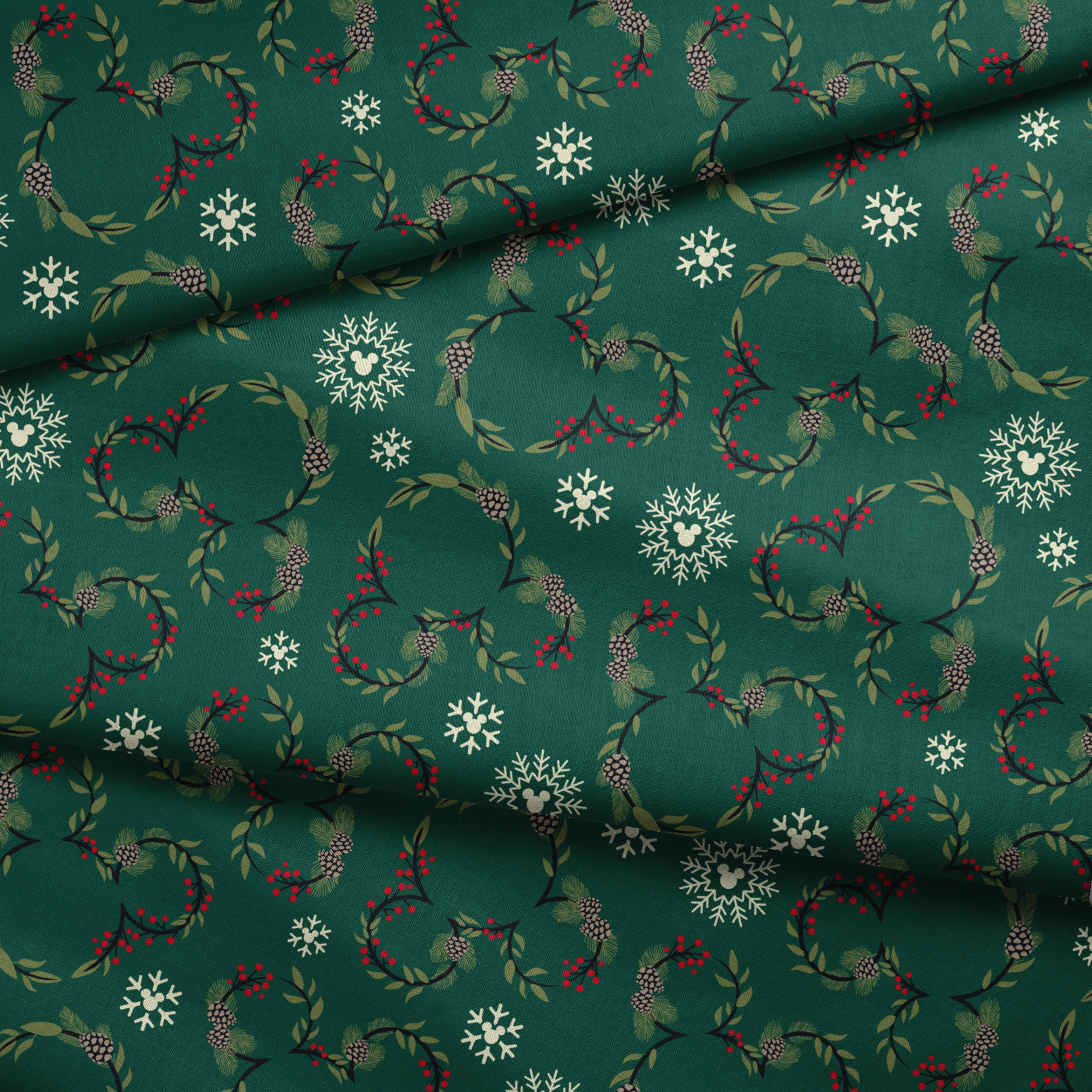 Holiday pattern with green wreaths, pinecones, red berries and white snowflakes on dark green background fabric fold mockup