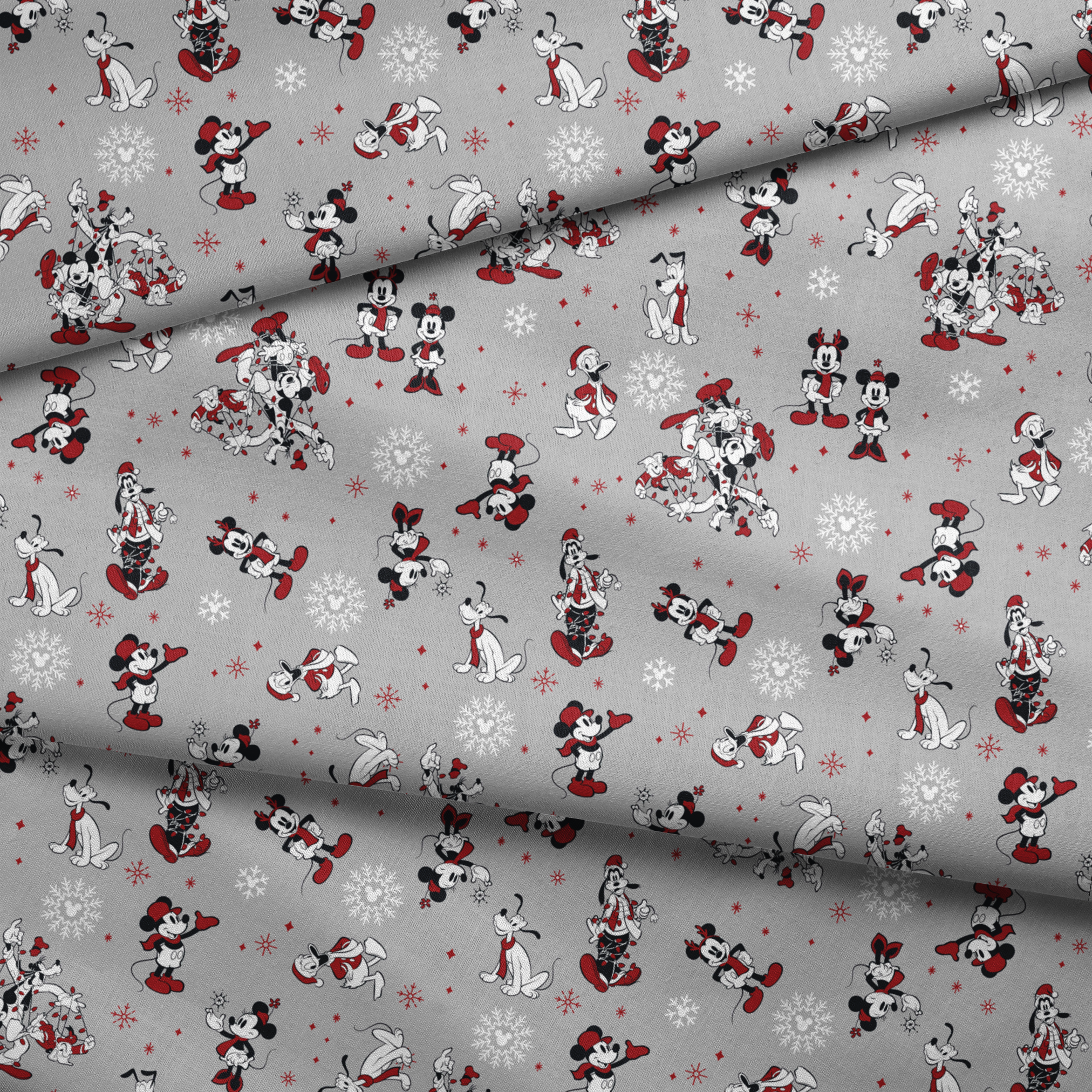 Mickey and Minnie Mouse characters in winter attire with snowflakes on gray background fabric fold mockup
