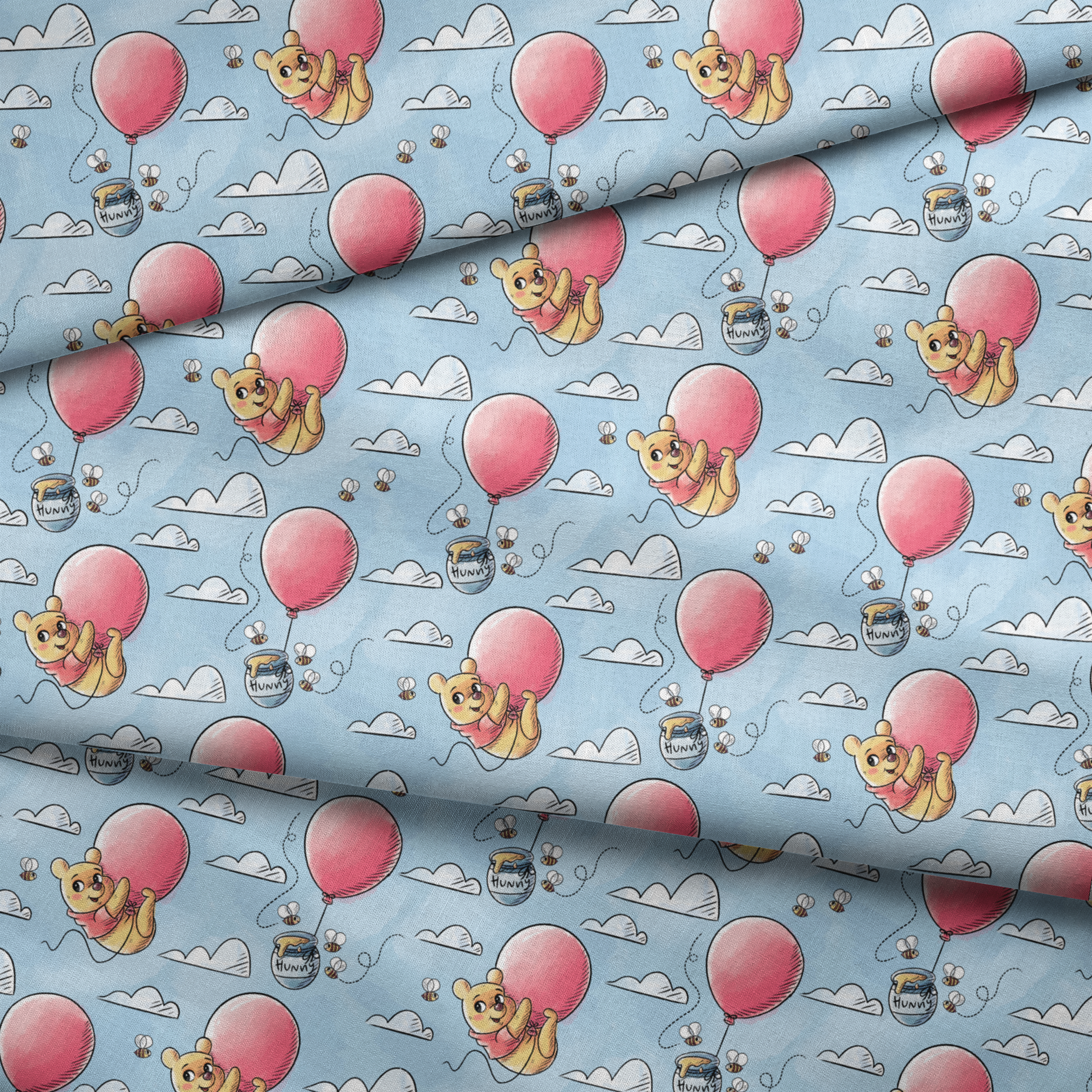 Cute yellow bear characters floating with pink balloons and honey pots against a blue sky with cl... fabric fold mockup