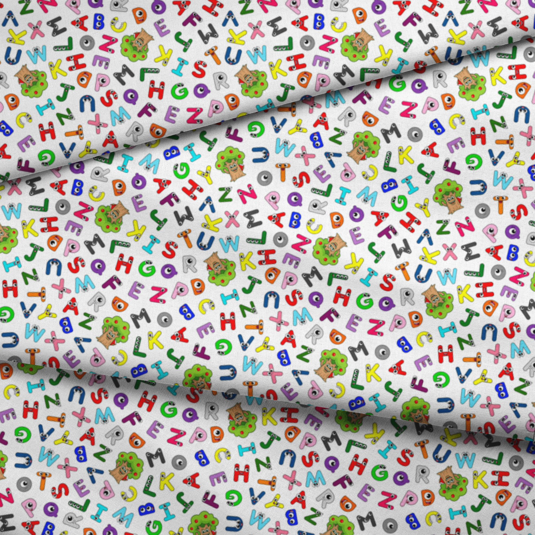 Colorful cartoon alphabet letters scattered randomly on white background with small monster characters fabric fold mockup