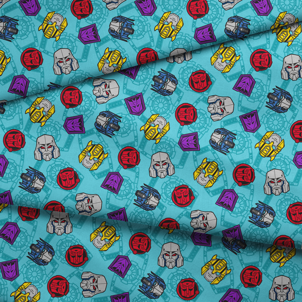 Hasbro Transformers Robot Heads on Turquoise | Fabric by the Yard